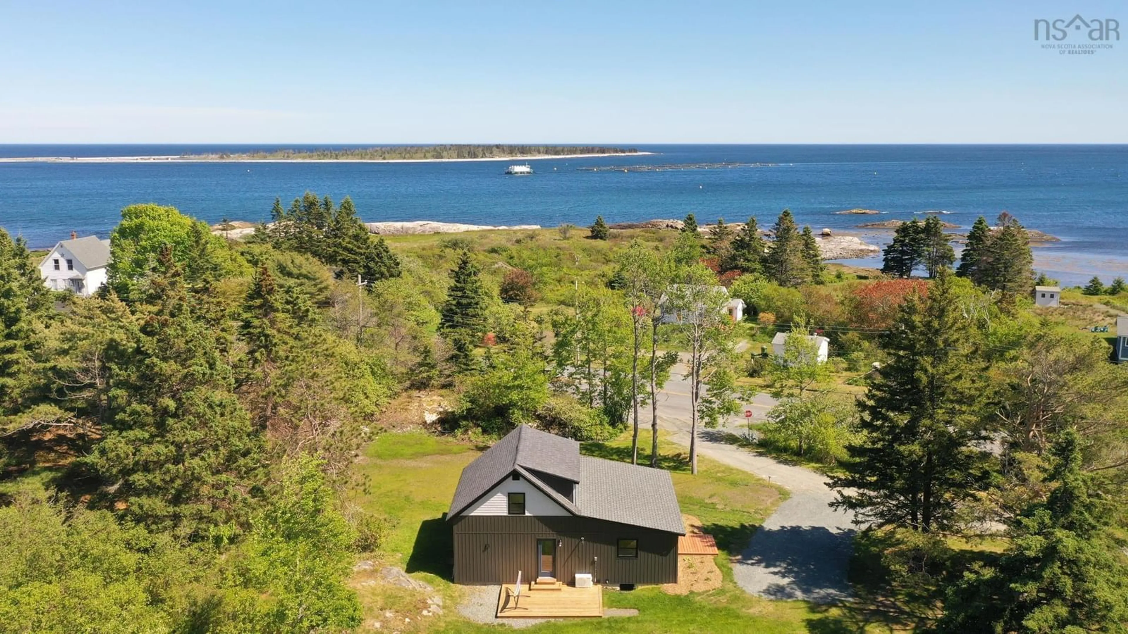 A pic from outside/outdoor area/front of a property/back of a property/a pic from drone, water/lake/river/ocean view for 31 Shore View Dr, Beach Meadows Nova Scotia B0J 1H0