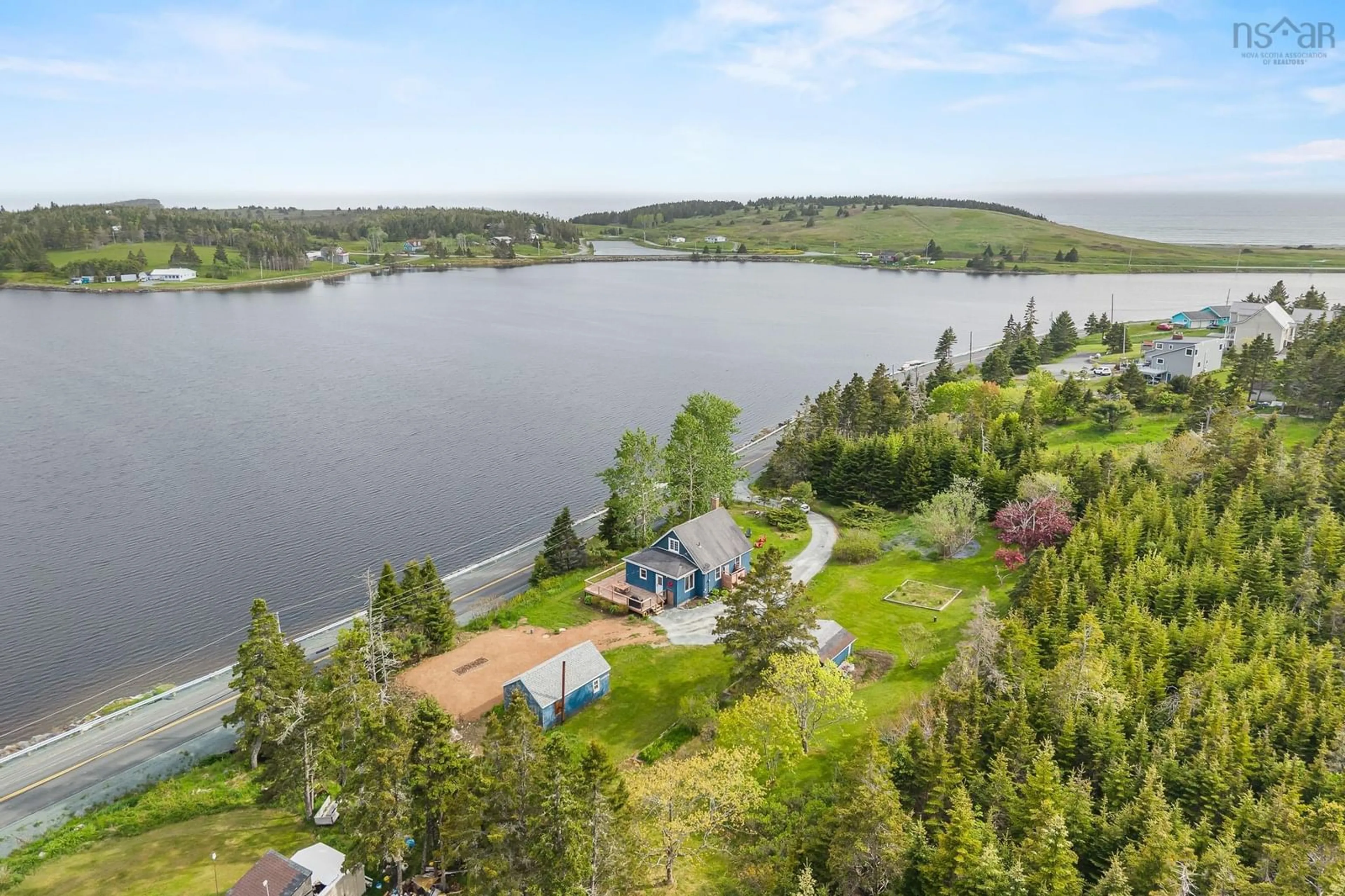 A pic from outside/outdoor area/front of a property/back of a property/a pic from drone, water/lake/river/ocean view for 2495 Crowell Rd, Lawrencetown Nova Scotia B2Z 1P5