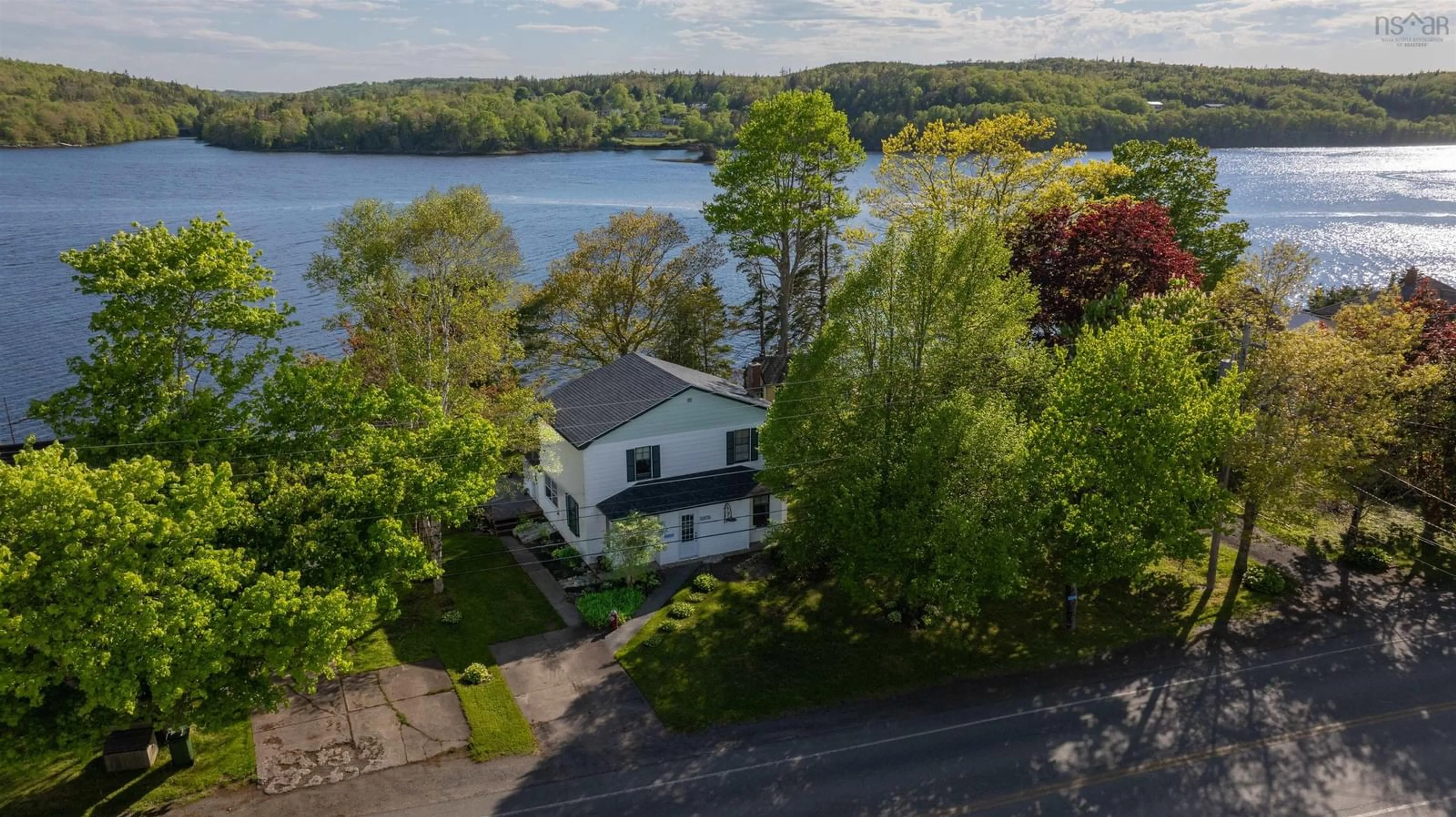 A pic from outside/outdoor area/front of a property/back of a property/a pic from drone, water/lake/river/ocean view for 22676 Highway 7, Sheet Harbour Nova Scotia B0J 3H0