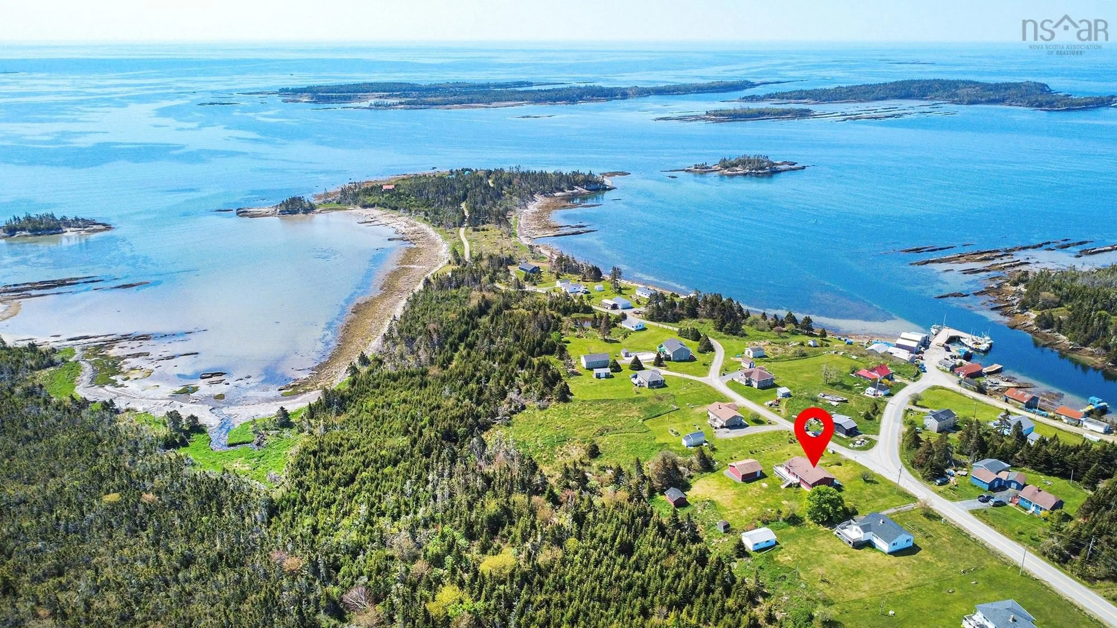 A pic from outside/outdoor area/front of a property/back of a property/a pic from drone, water/lake/river/ocean view for 553 Little Harbour Rd, Eastern Shore Nova Scotia B0J 1Y0