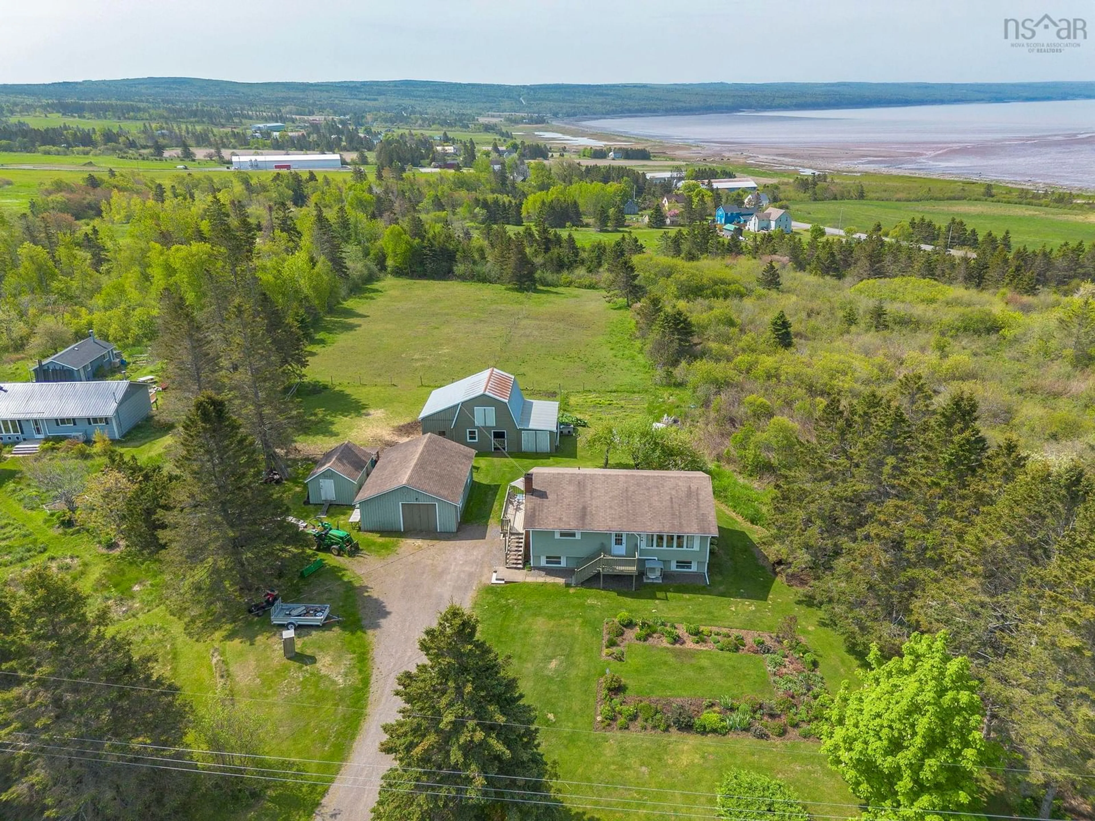 A pic from outside/outdoor area/front of a property/back of a property/a pic from drone, water/lake/river/ocean view for 48 Rogers Rd, Scots Bay Nova Scotia B0P 1H0