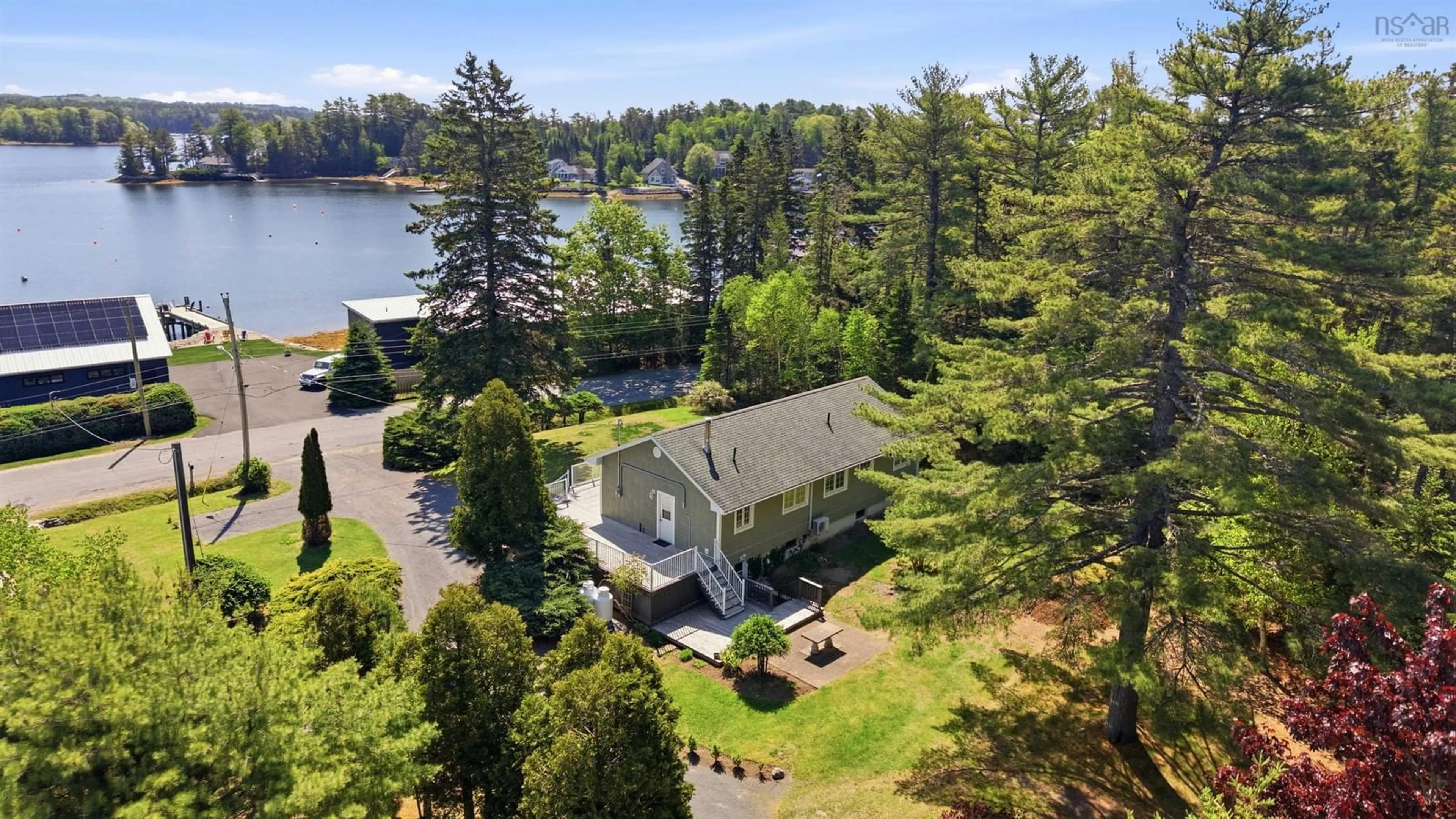A pic from outside/outdoor area/front of a property/back of a property/a pic from drone, water/lake/river/ocean view for 148 Borgalds Point Rd, Chester Basin Nova Scotia B0J 1K0