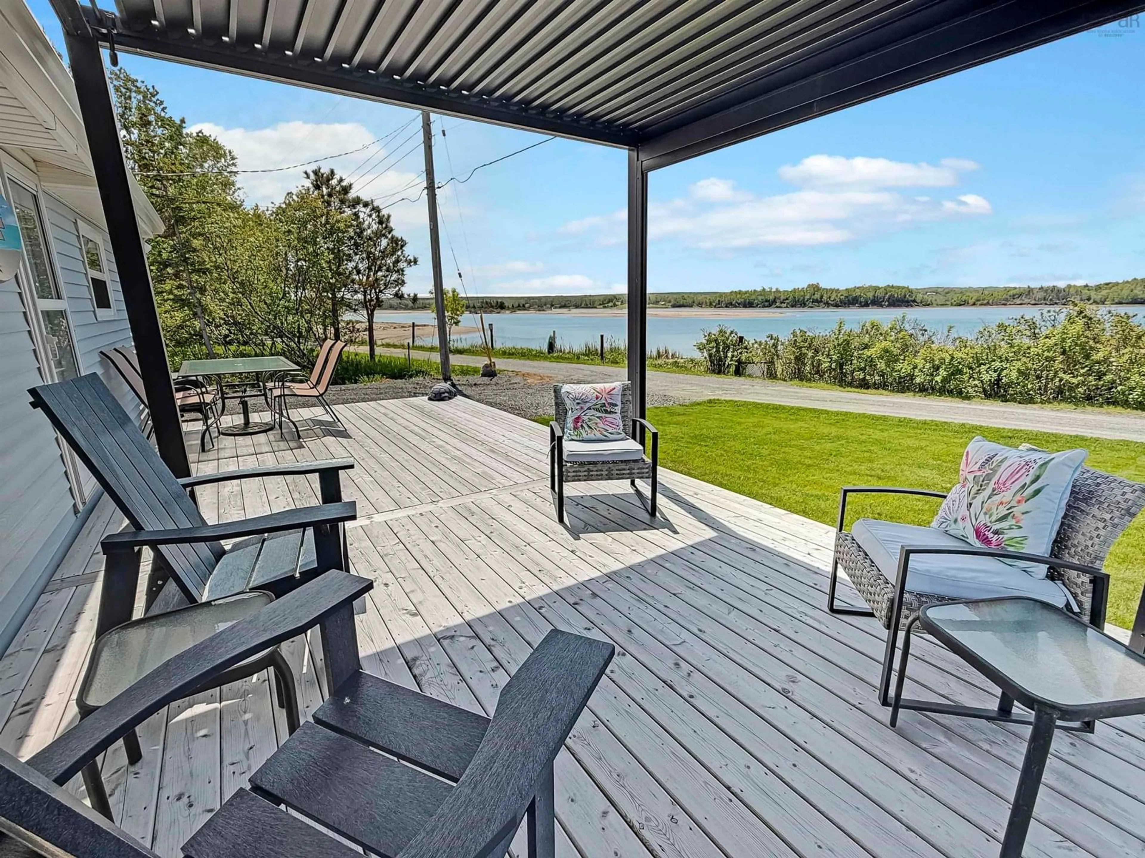 Patio, water/lake/river/ocean view for 41 Sand Piper Lane, Black Point Nova Scotia B0K 1X0