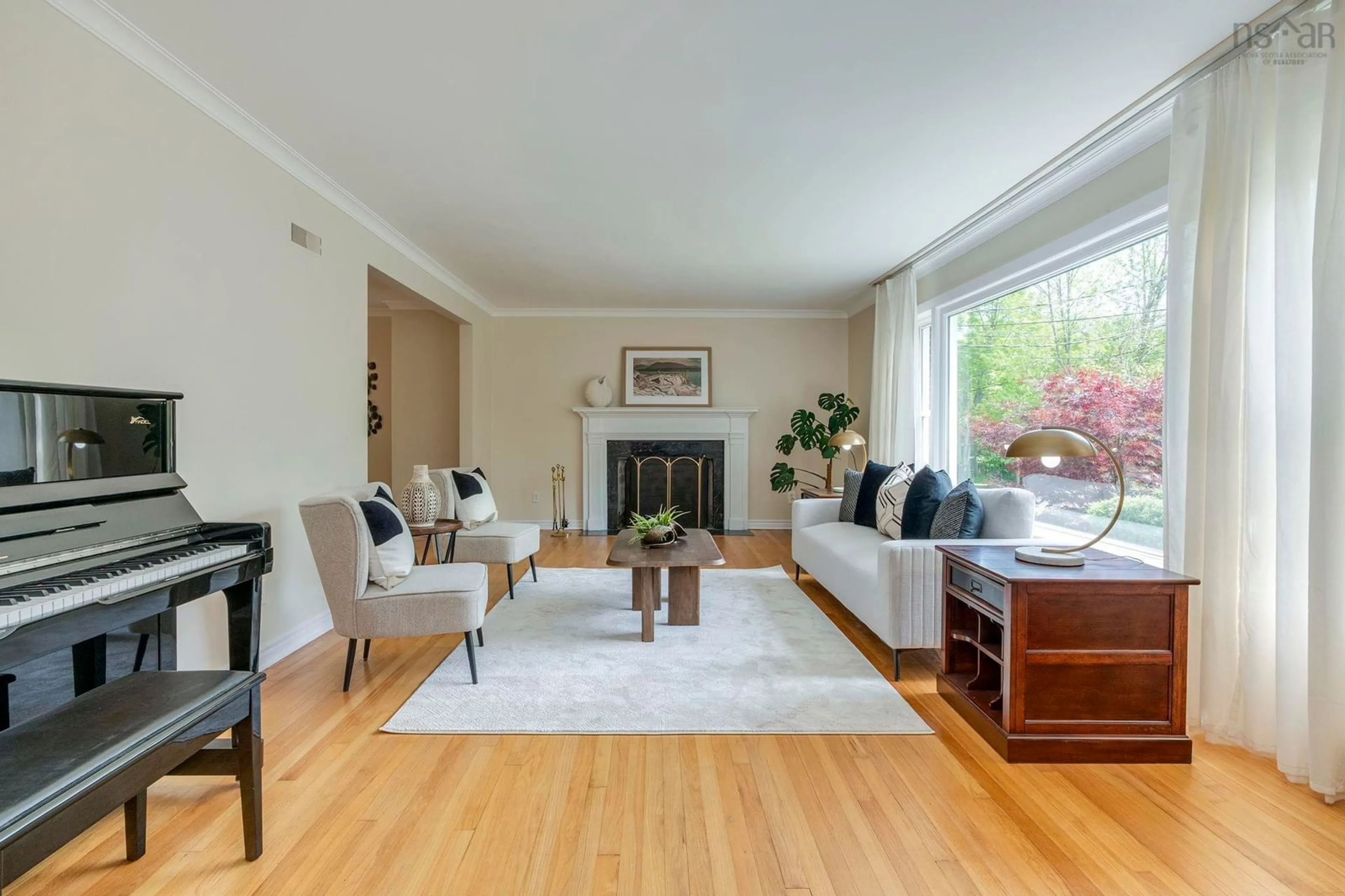 Living room with furniture, wood/laminate floor for 985 Beaufort Ave, Halifax Nova Scotia B3H 3X9
