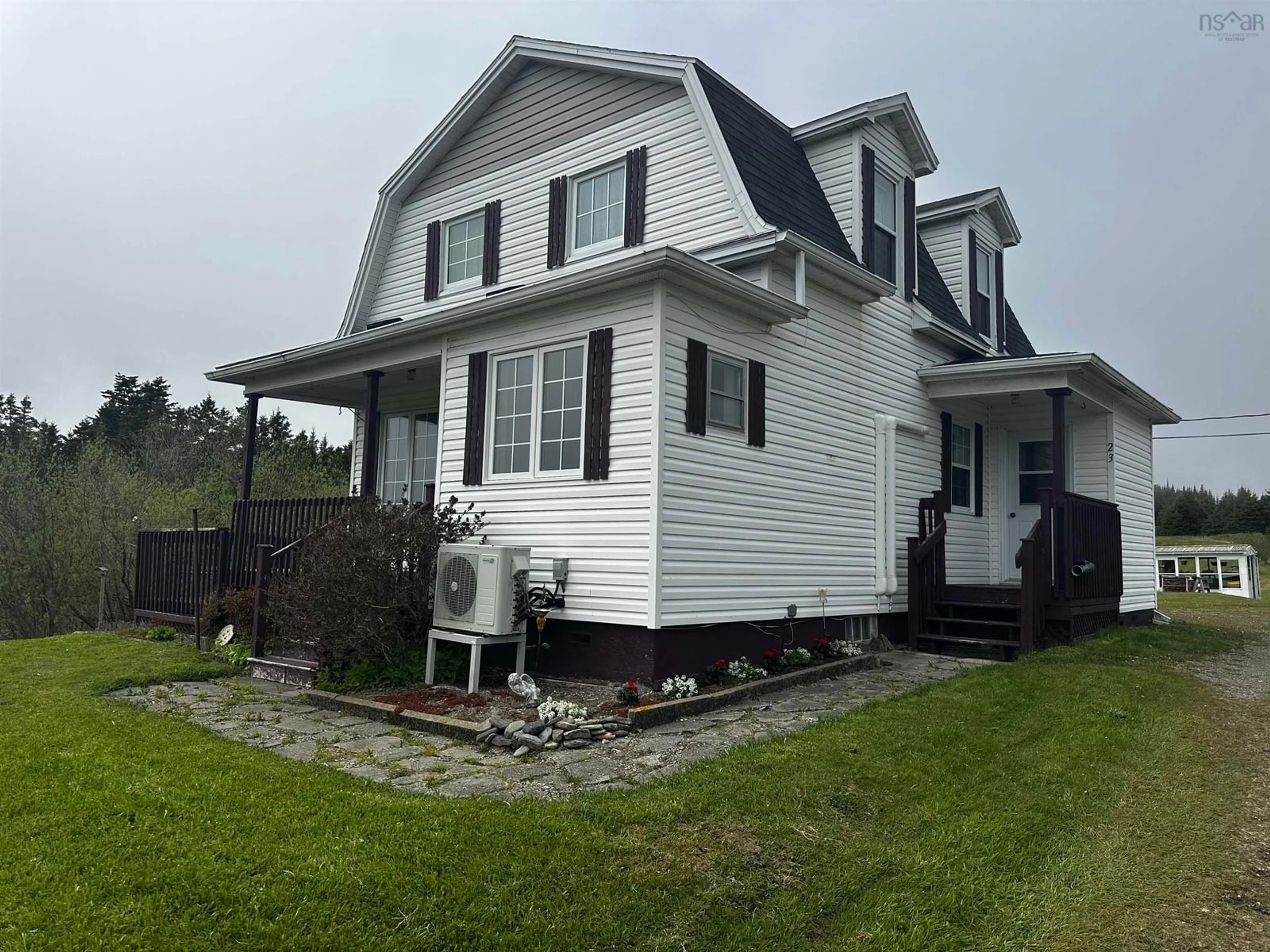 Home with vinyl exterior material, building for 23 Boulet Lane, L'Ardoise Nova Scotia B0E 1S0