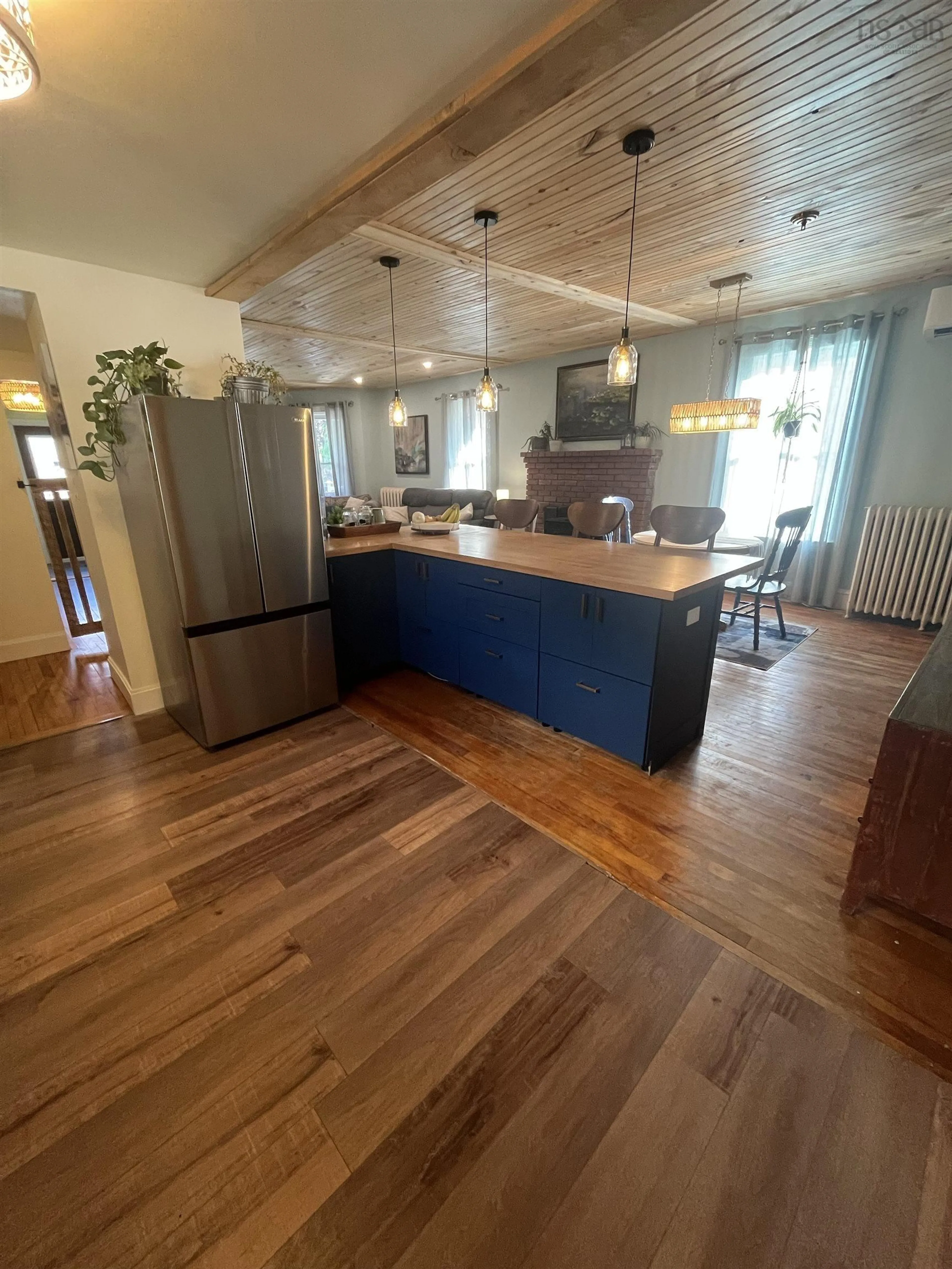 Open concept kitchen, wood/laminate floor for 145 Willow Avenue, New Glasgow Nova Scotia B2H 1Z6
