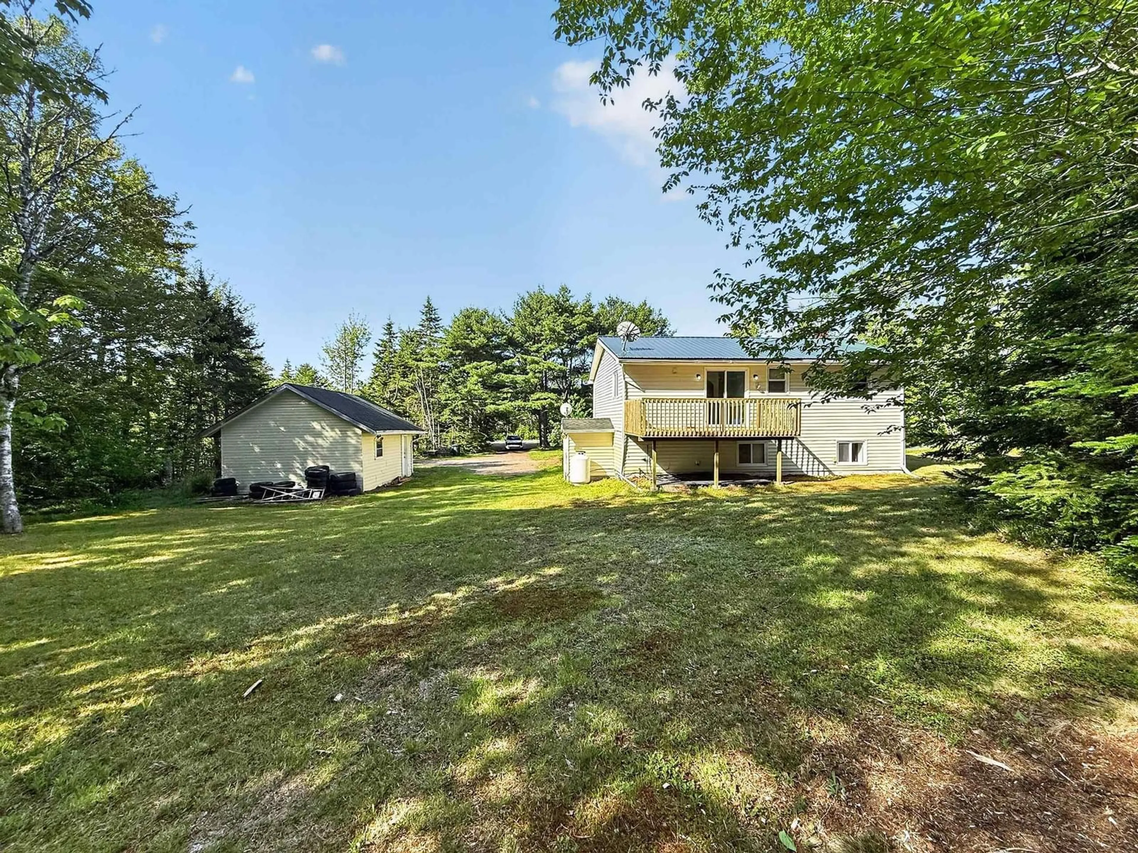A pic from outside/outdoor area/front of a property/back of a property/a pic from drone, forest/trees view for 860 Truro Rd, North River Nova Scotia B6L 6W3