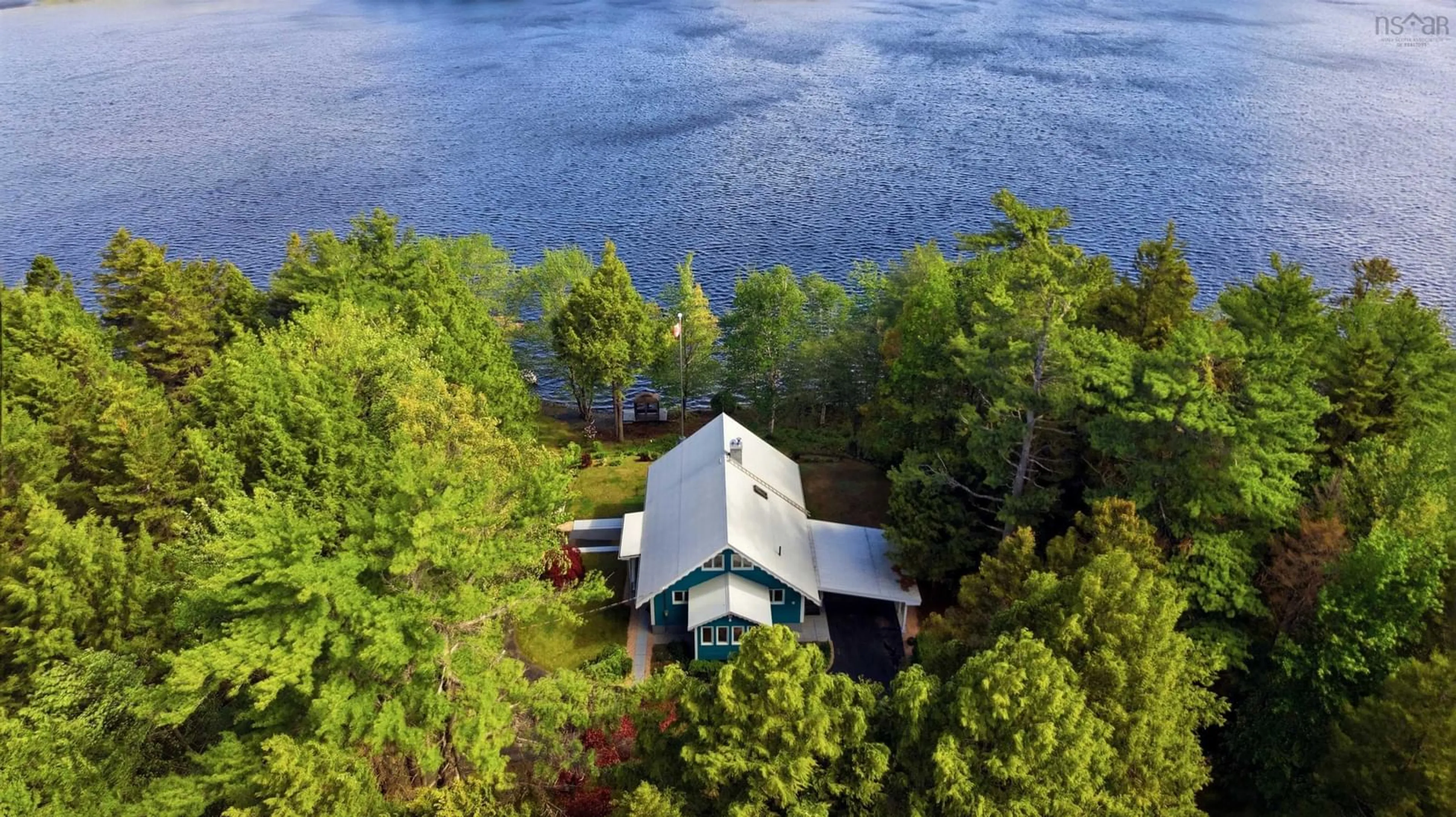 A pic from outside/outdoor area/front of a property/back of a property/a pic from drone, water/lake/river/ocean view for 3570 Highway 325, Newcombville Nova Scotia B4V 7V5