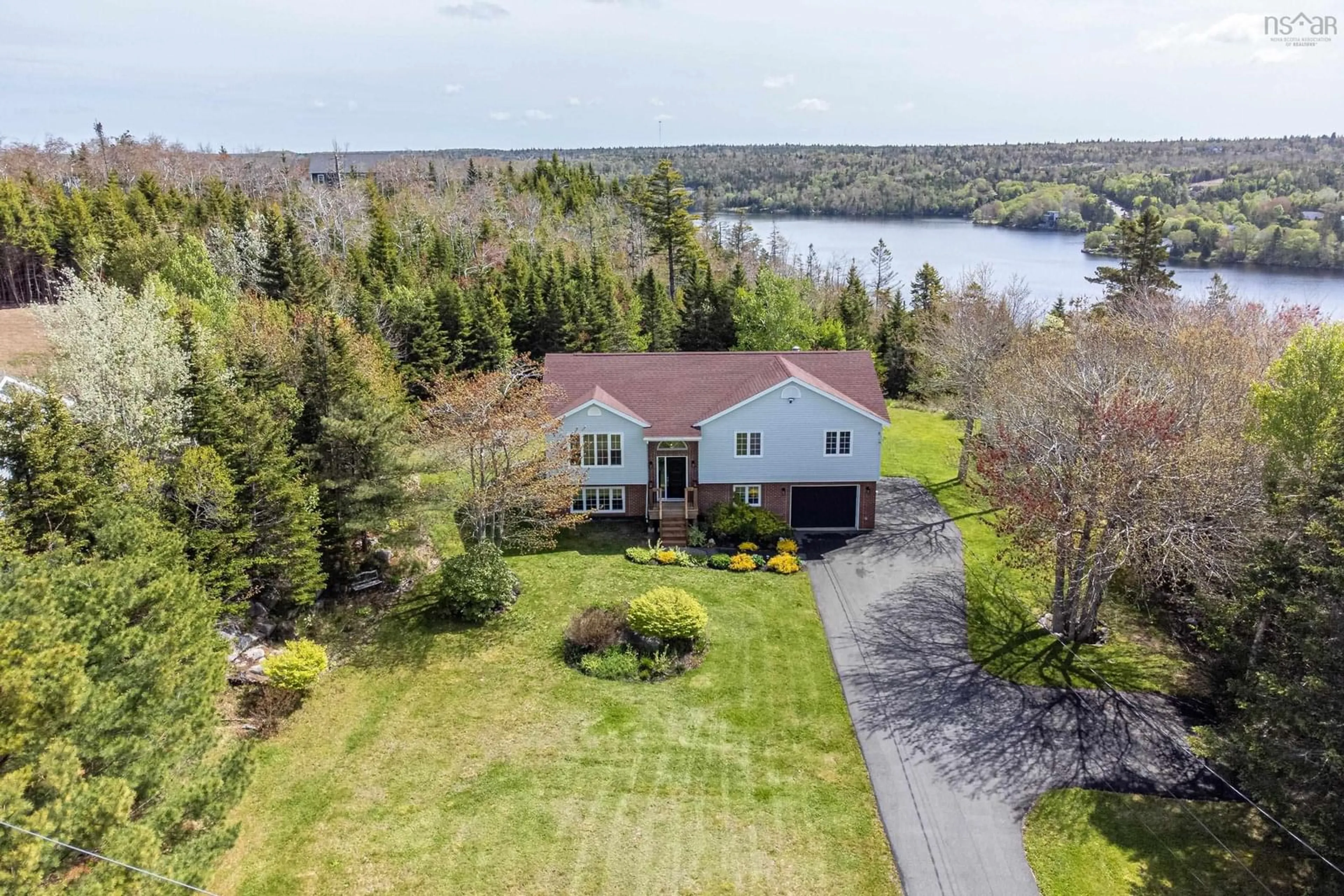 A pic from outside/outdoor area/front of a property/back of a property/a pic from drone, water/lake/river/ocean view for 163 Bayview Dr, Whites Lake Nova Scotia B3T 1Z1