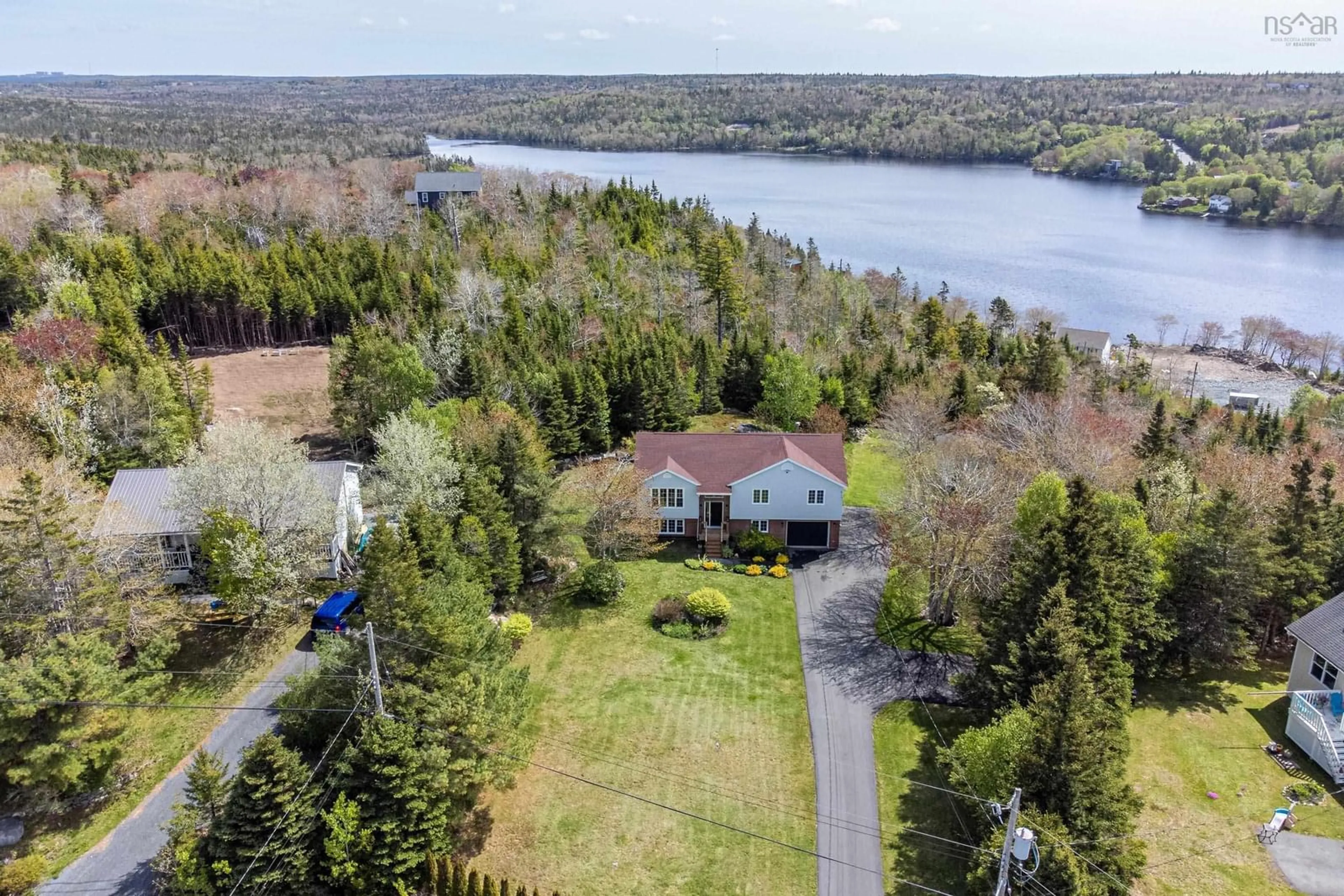 A pic from outside/outdoor area/front of a property/back of a property/a pic from drone, water/lake/river/ocean view for 163 Bayview Dr, Whites Lake Nova Scotia B3T 1Z1