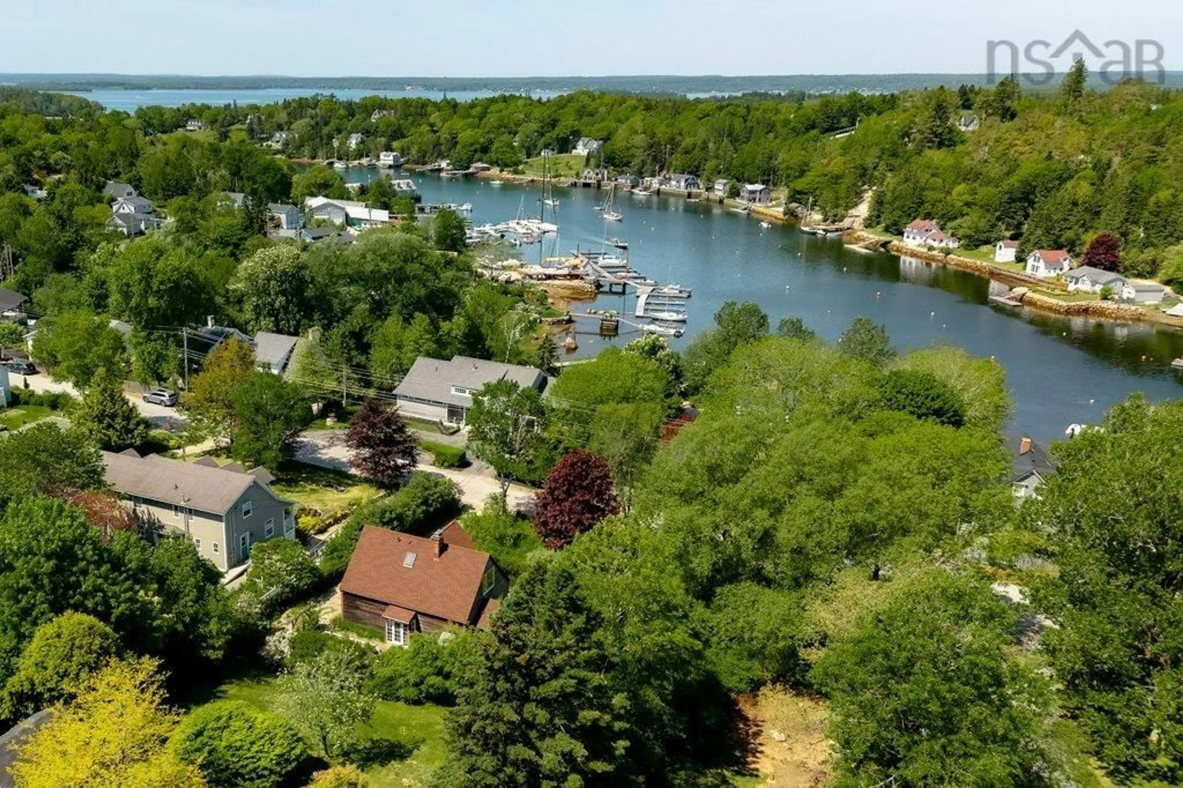 A pic from outside/outdoor area/front of a property/back of a property/a pic from drone, water/lake/river/ocean view for 208 Victoria St, Chester Nova Scotia B0J 1J0
