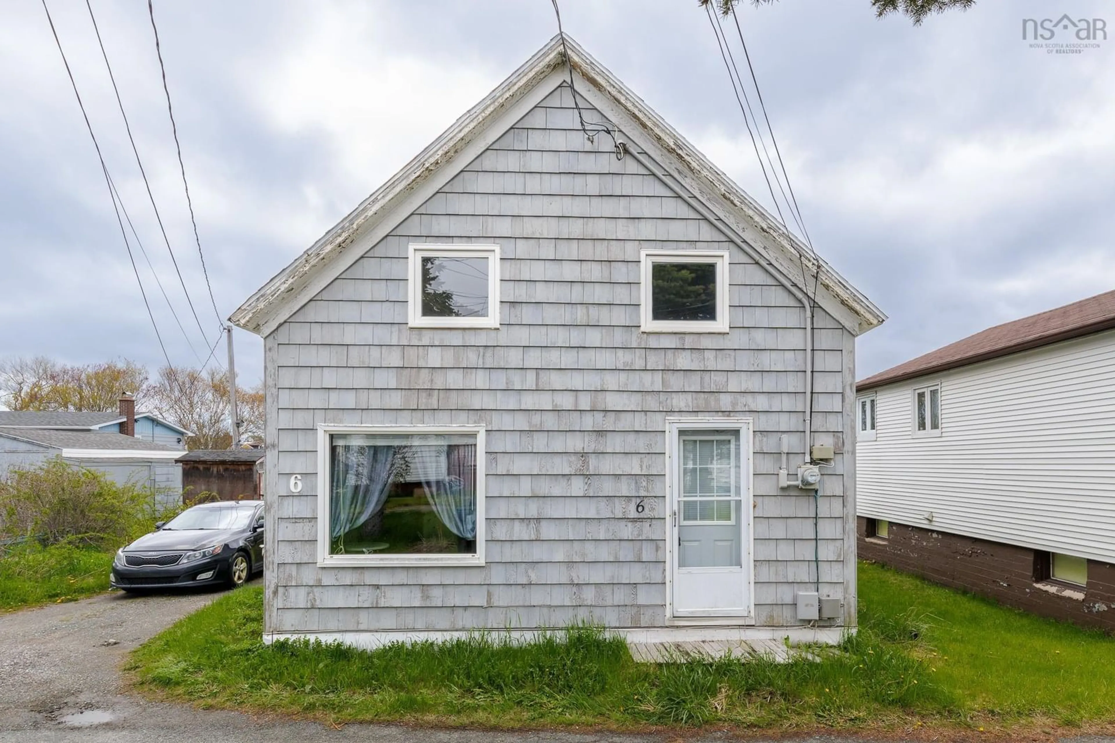 Home with vinyl exterior material, street for 6 Miles Lane, Glace Bay Nova Scotia B1A 1M9