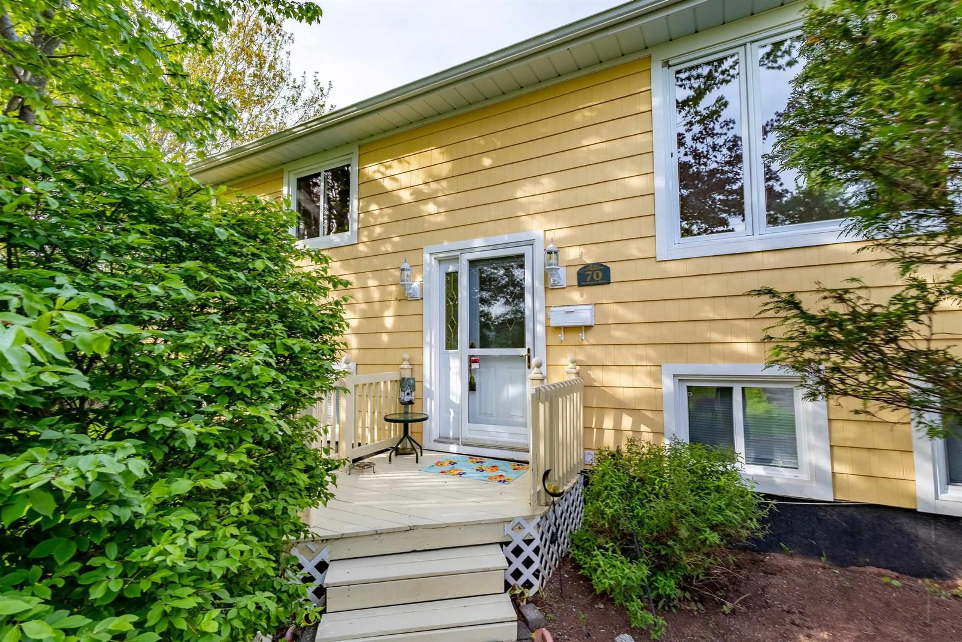 Home with vinyl exterior material, street for 70 Mackenzie Dr, Coxheath Nova Scotia B1R 2H2