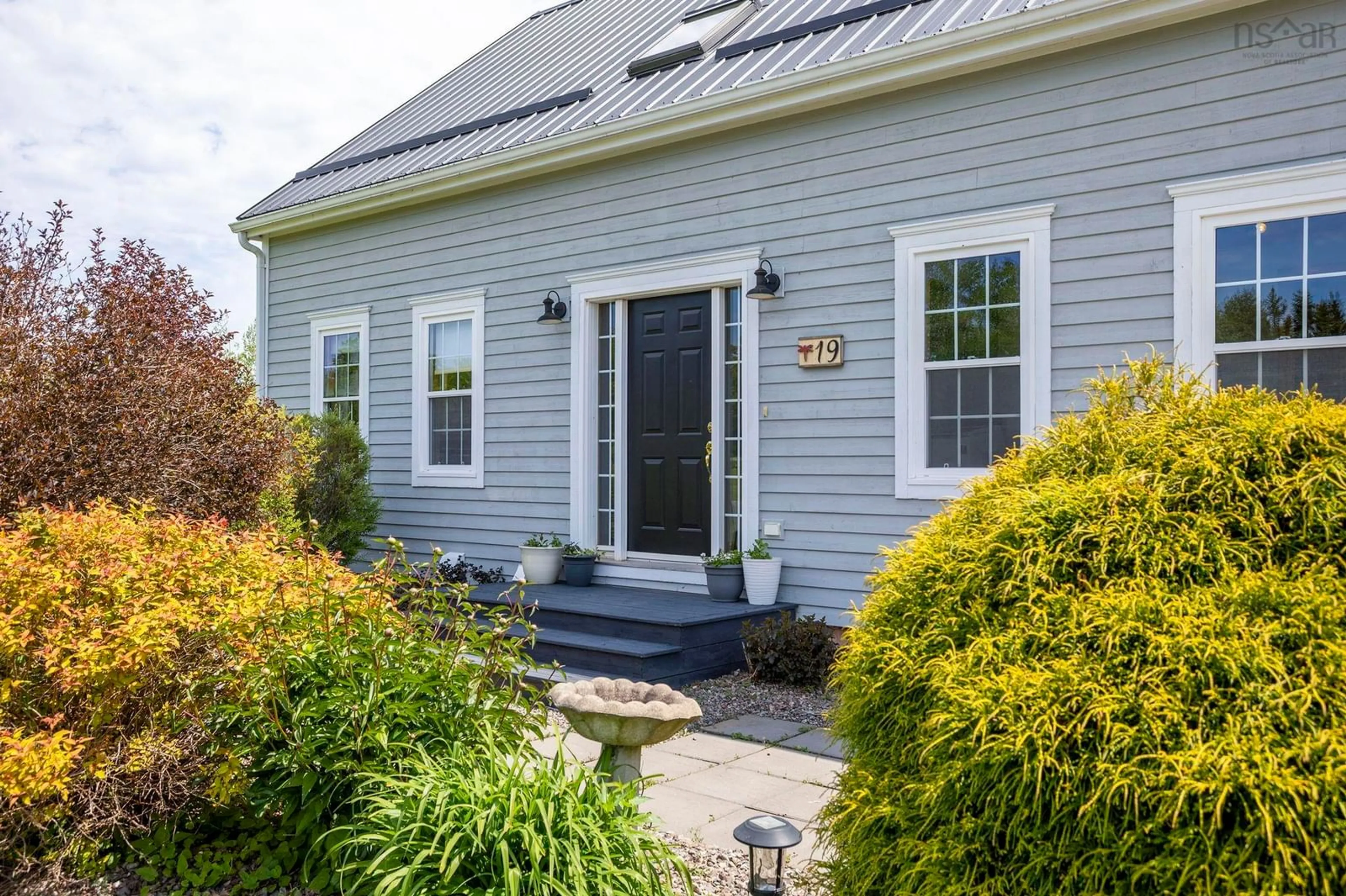 Home with vinyl exterior material, street for 19 Sandy Cove Lane, Braeshore Nova Scotia B0K 1H0