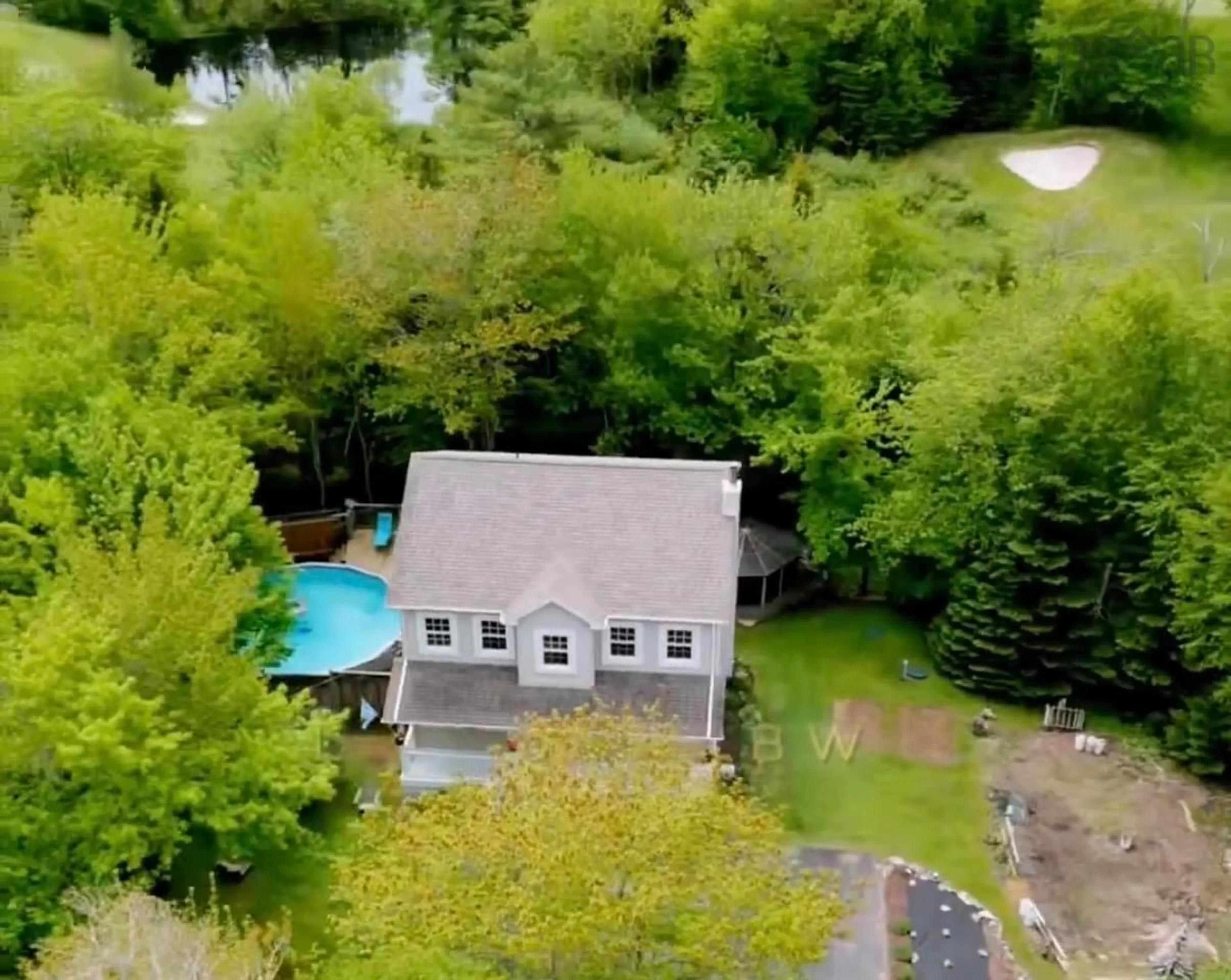 A pic from outside/outdoor area/front of a property/back of a property/a pic from drone, water/lake/river/ocean view for 88 Lochmoor Lane, Dartmouth Nova Scotia B2W 6C8