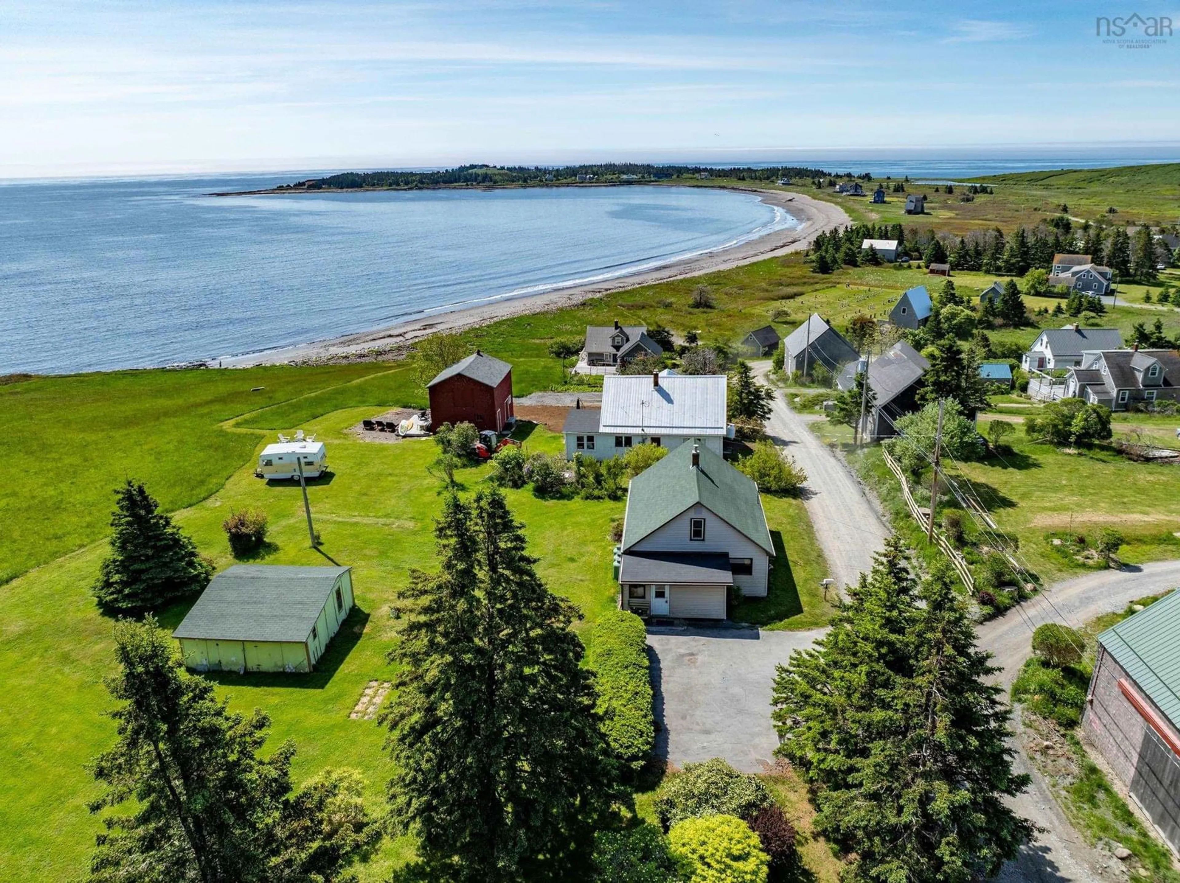 A pic from outside/outdoor area/front of a property/back of a property/a pic from drone, water/lake/river/ocean view for 79 Mosher Rd, Kingsburg Nova Scotia B0J 2X0