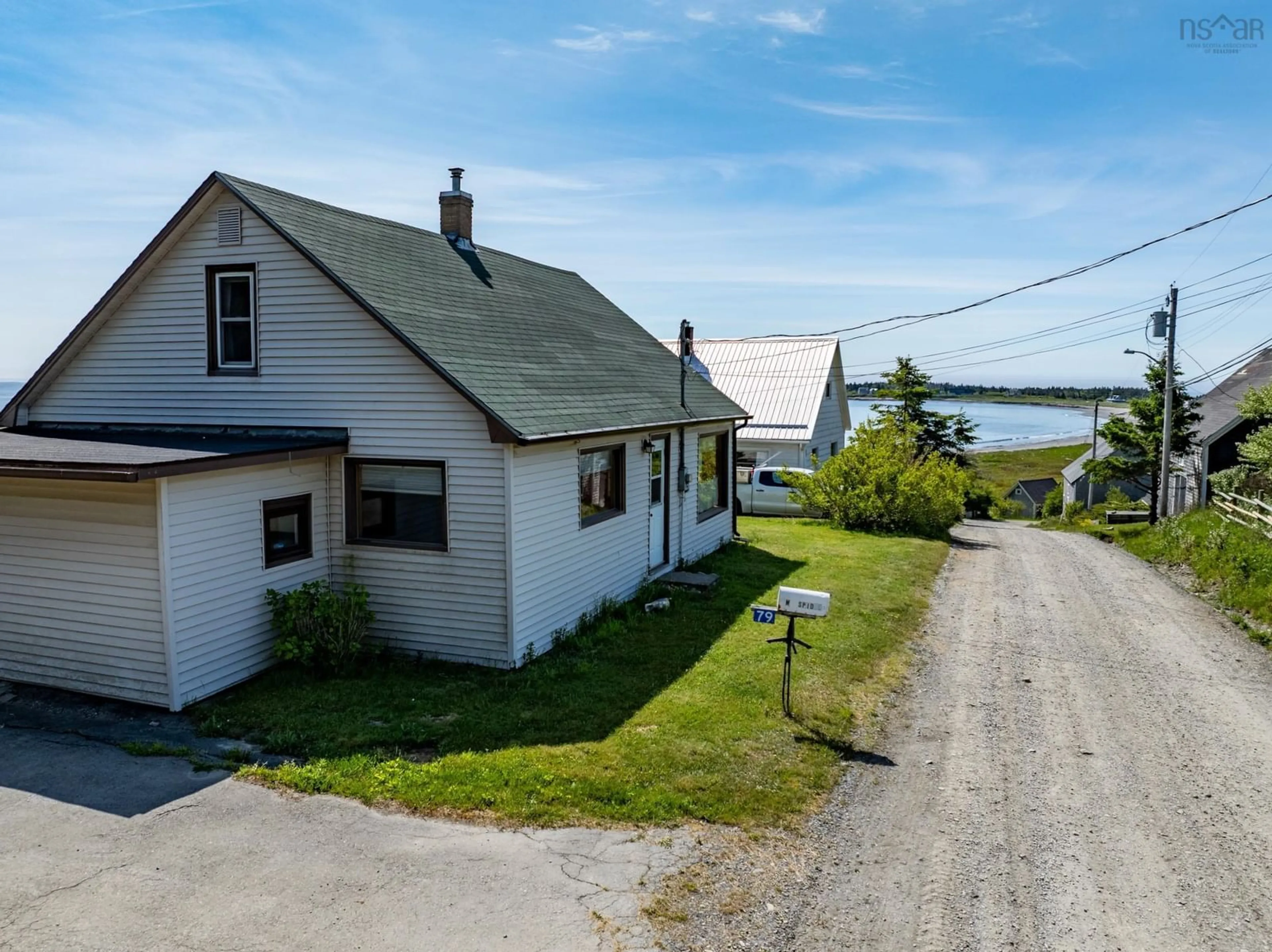 A pic from outside/outdoor area/front of a property/back of a property/a pic from drone, water/lake/river/ocean view for 79 Mosher Rd, Kingsburg Nova Scotia B0J 2X0