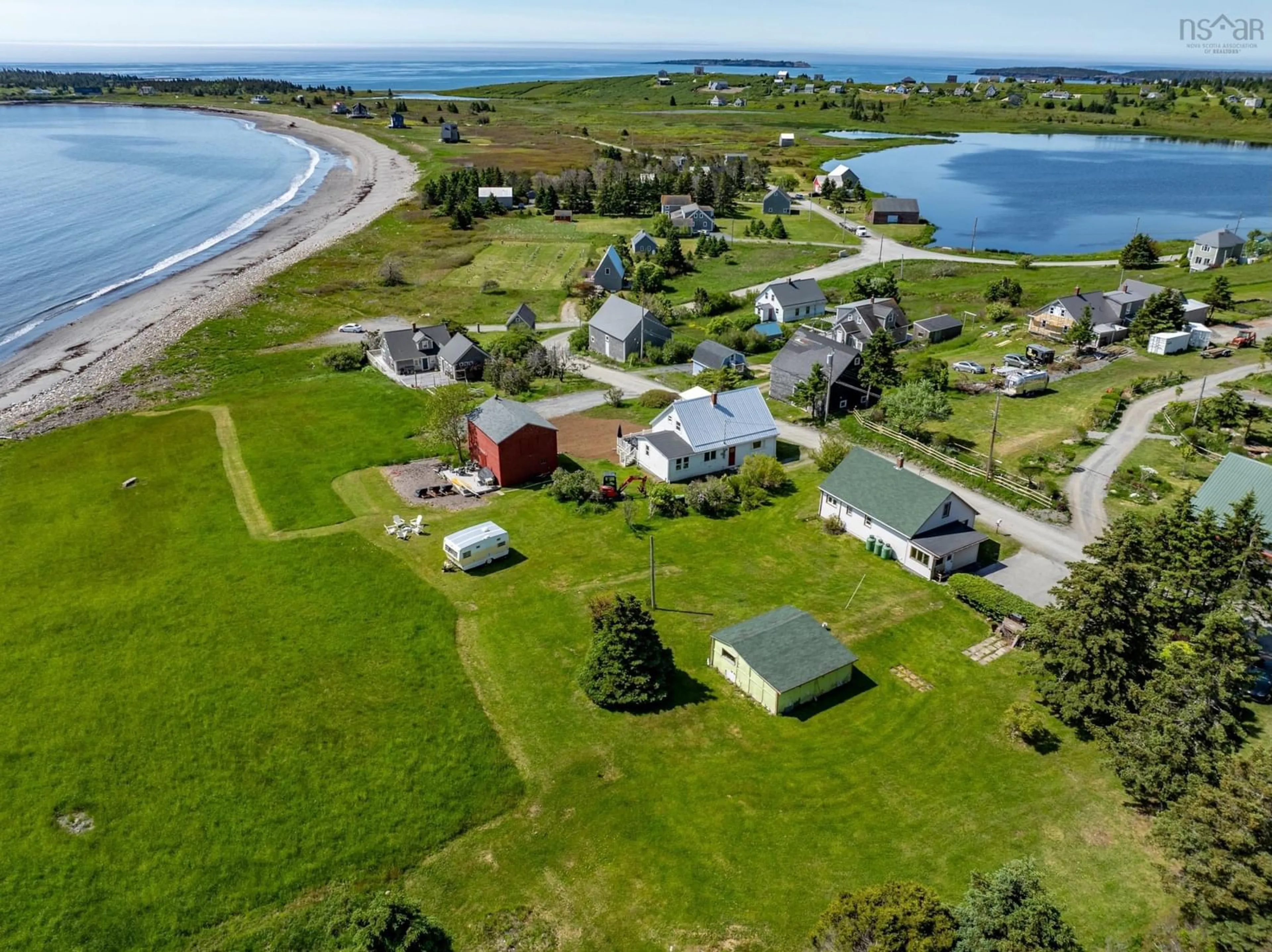 A pic from outside/outdoor area/front of a property/back of a property/a pic from drone, water/lake/river/ocean view for 79 Mosher Rd, Kingsburg Nova Scotia B0J 2X0