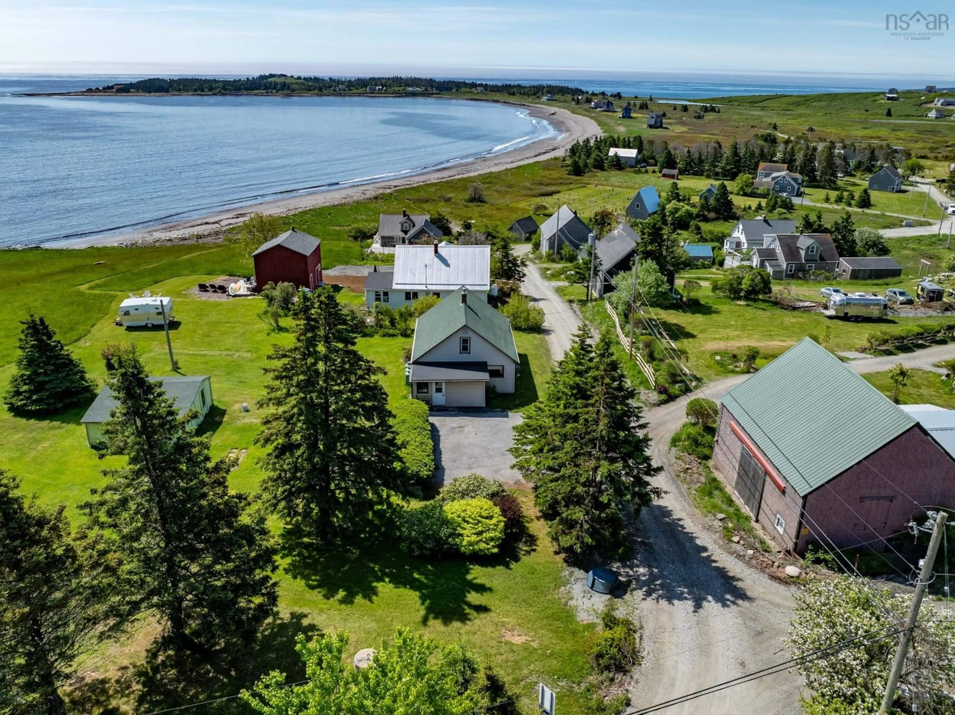 A pic from outside/outdoor area/front of a property/back of a property/a pic from drone, water/lake/river/ocean view for 79 Mosher Rd, Kingsburg Nova Scotia B0J 2X0
