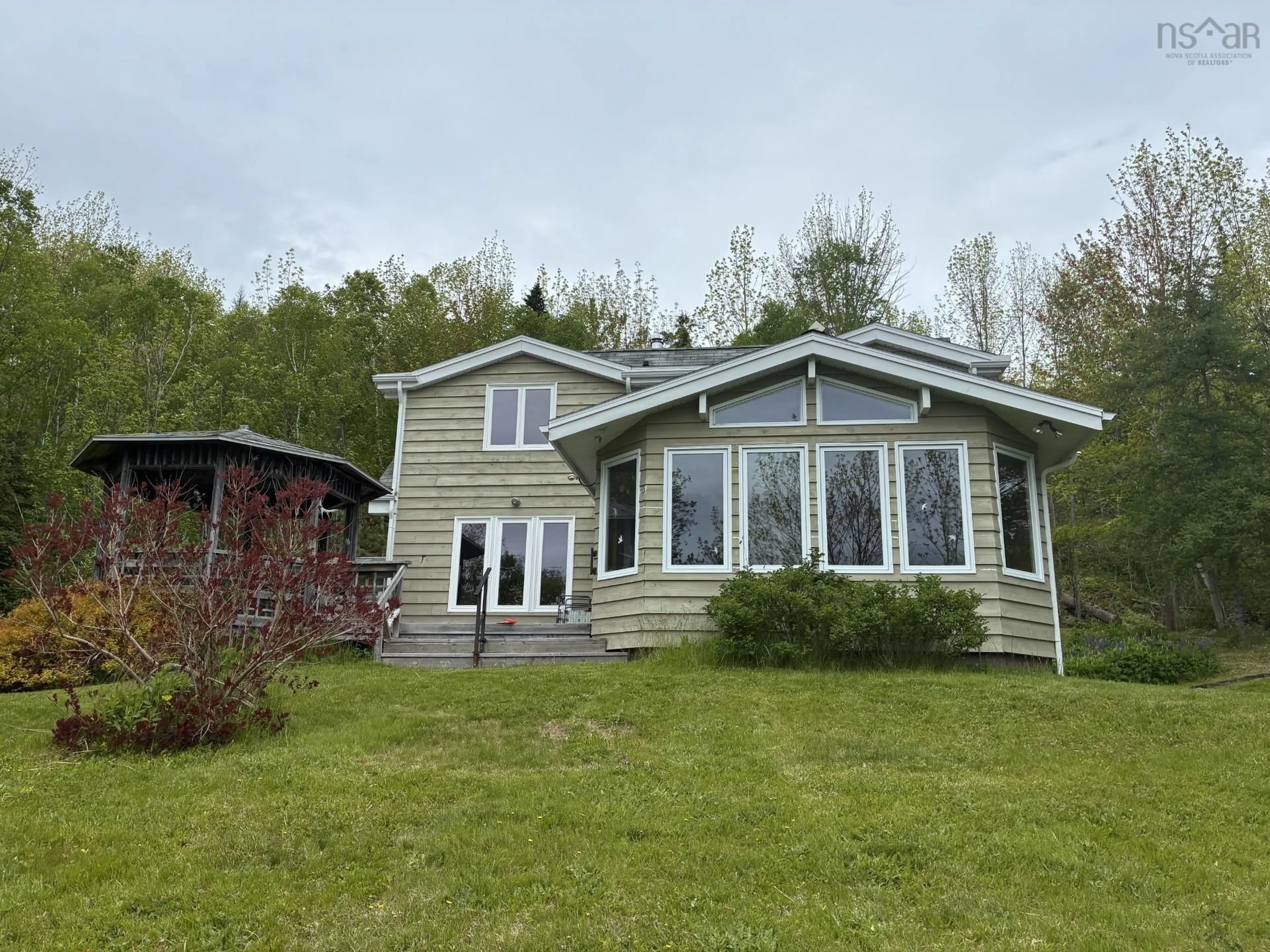 A pic from outside/outdoor area/front of a property/back of a property/a pic from drone, unknown for 4030 Marble Mountain Rd, Lime Hill Nova Scotia B0E 3K0