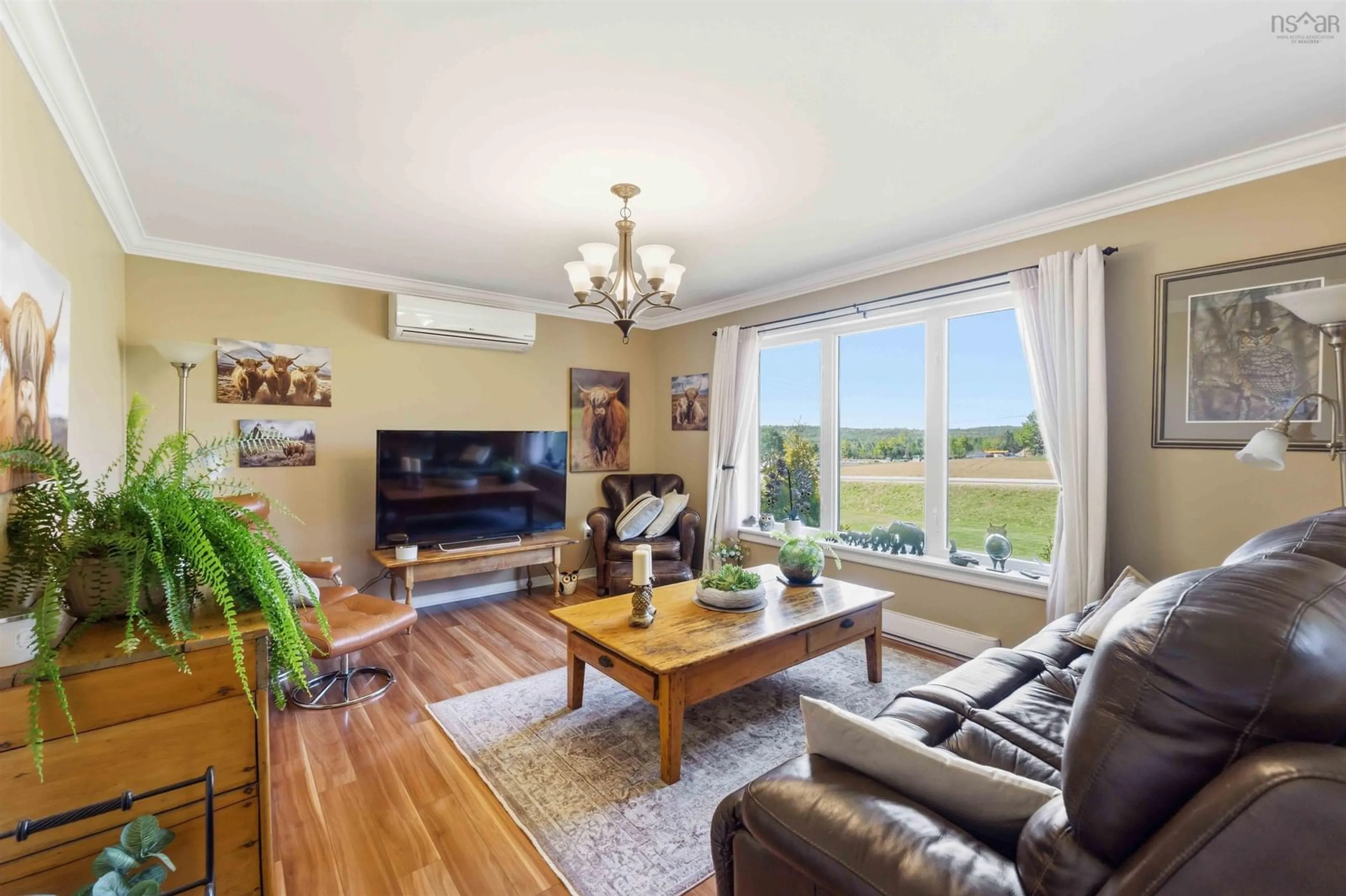Living room with furniture, wood/laminate floor for 598 English Mountain Rd, Canaan Nova Scotia B4N 3V8