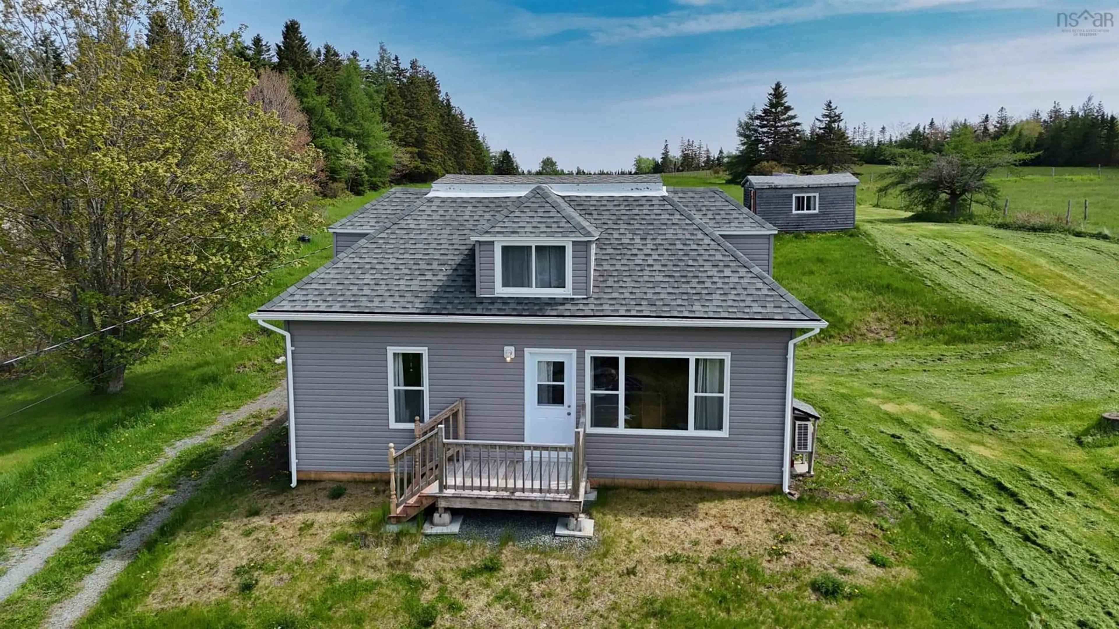 A pic from outside/outdoor area/front of a property/back of a property/a pic from drone, water/lake/river/ocean view for 50 Riverview Dr, South River Bourgeois Nova Scotia B0E 2X0