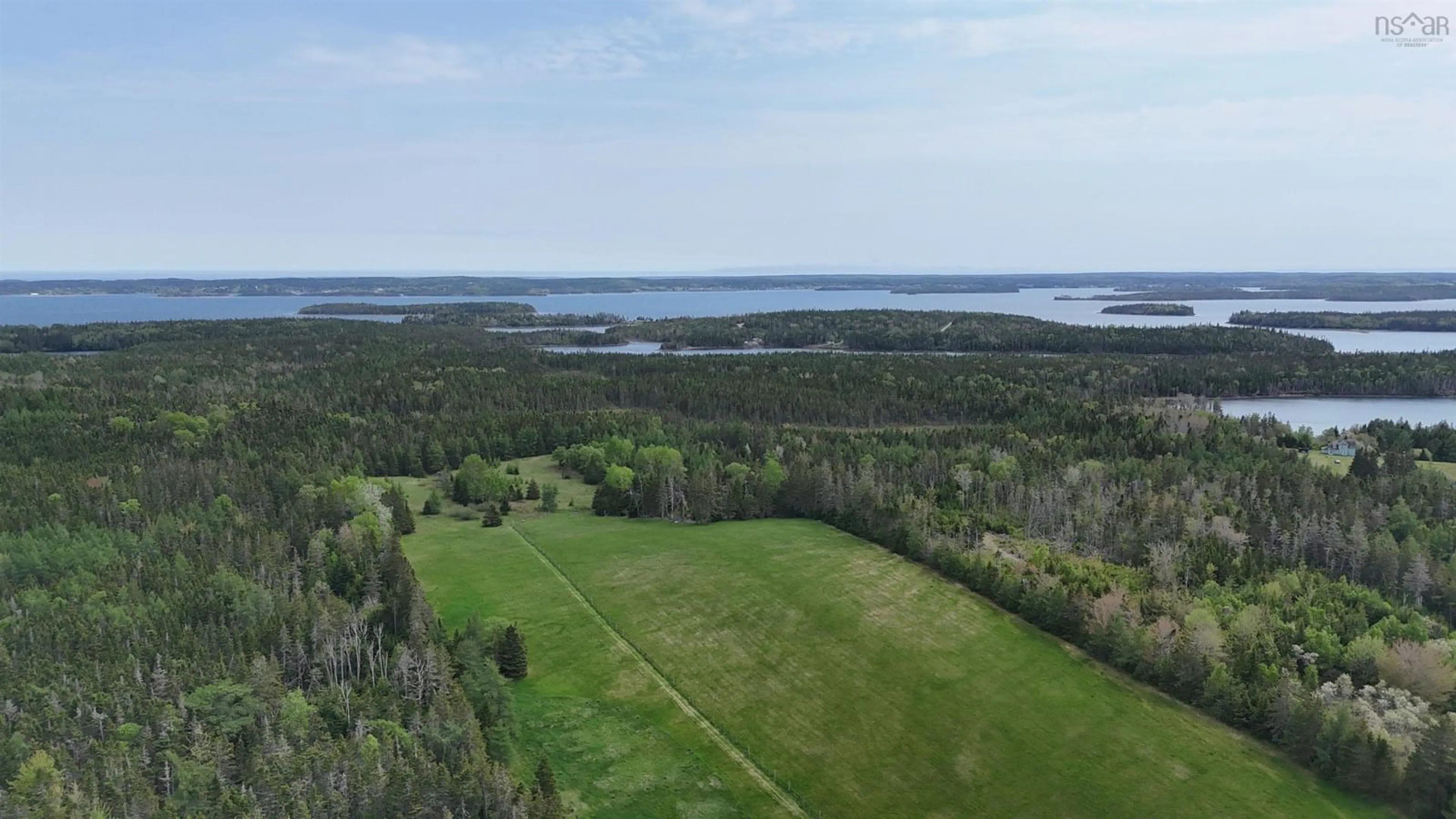 A pic from outside/outdoor area/front of a property/back of a property/a pic from drone, water/lake/river/ocean view for 50 Riverview Dr, South River Bourgeois Nova Scotia B0E 2X0