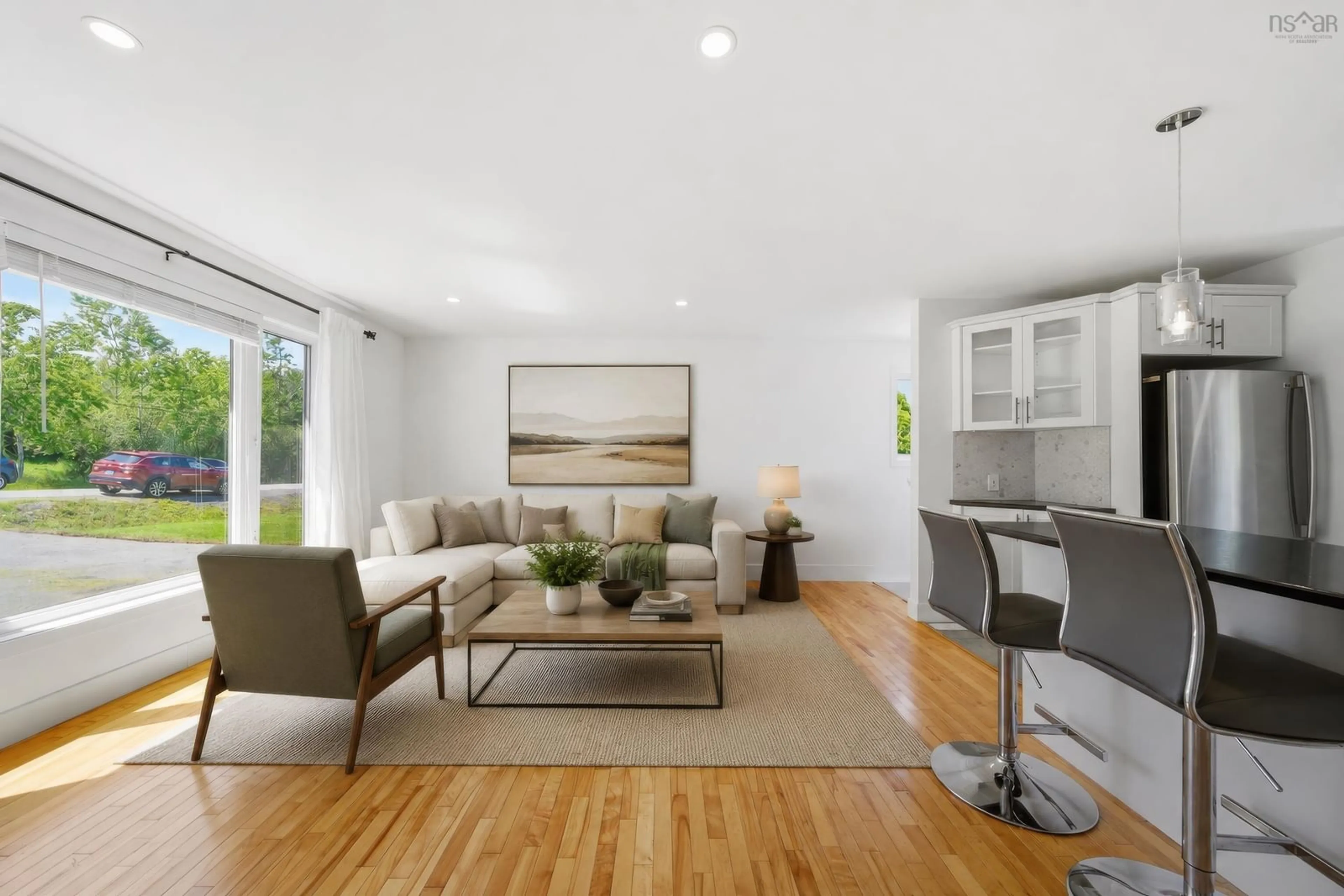 Living room with furniture, wood/laminate floor for 53 Maclaughlin Rd, Lake Loon Nova Scotia B2W 3R8