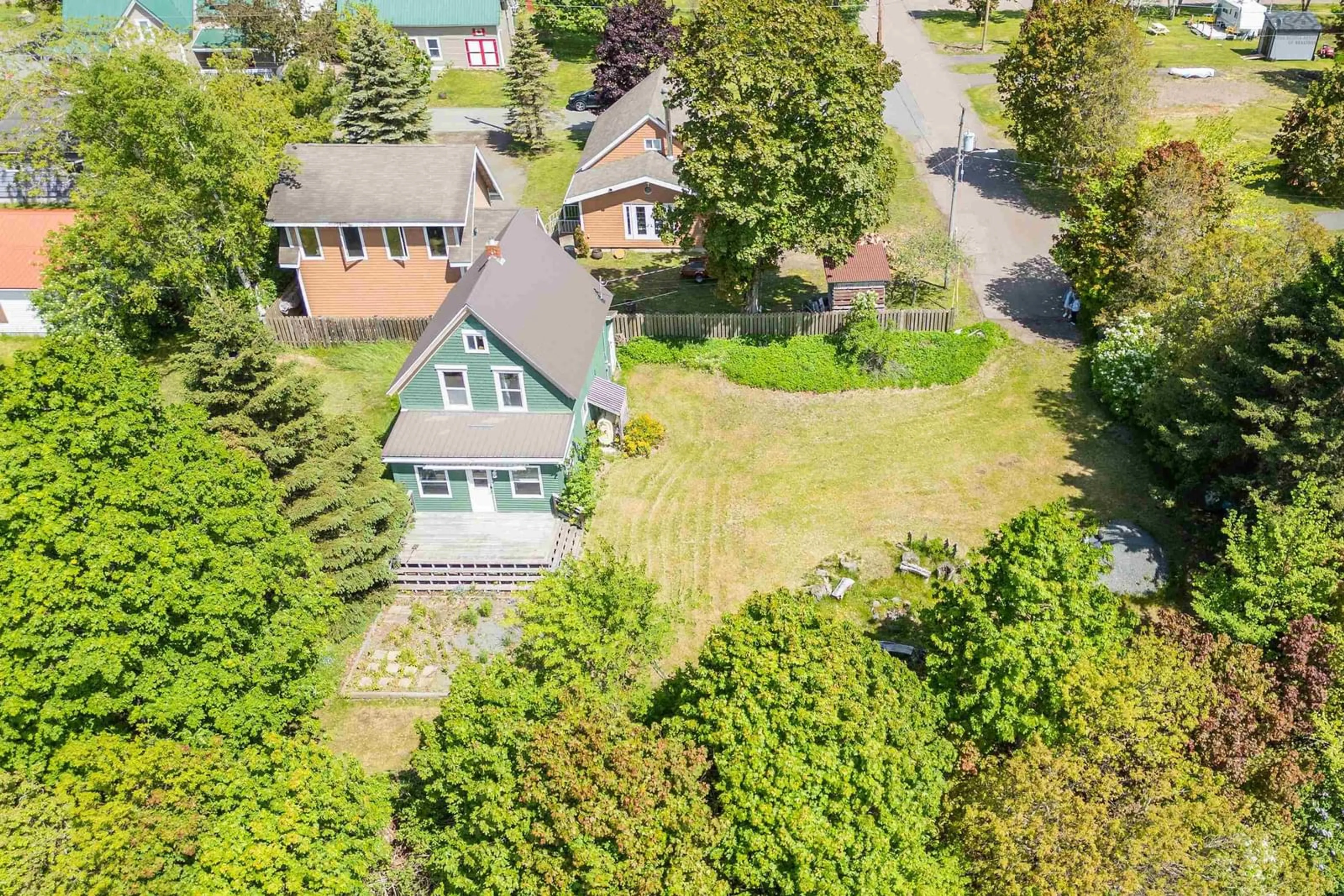 A pic from outside/outdoor area/front of a property/back of a property/a pic from drone, unknown for 1 Moore St, Parrsboro Nova Scotia B0M 1S0