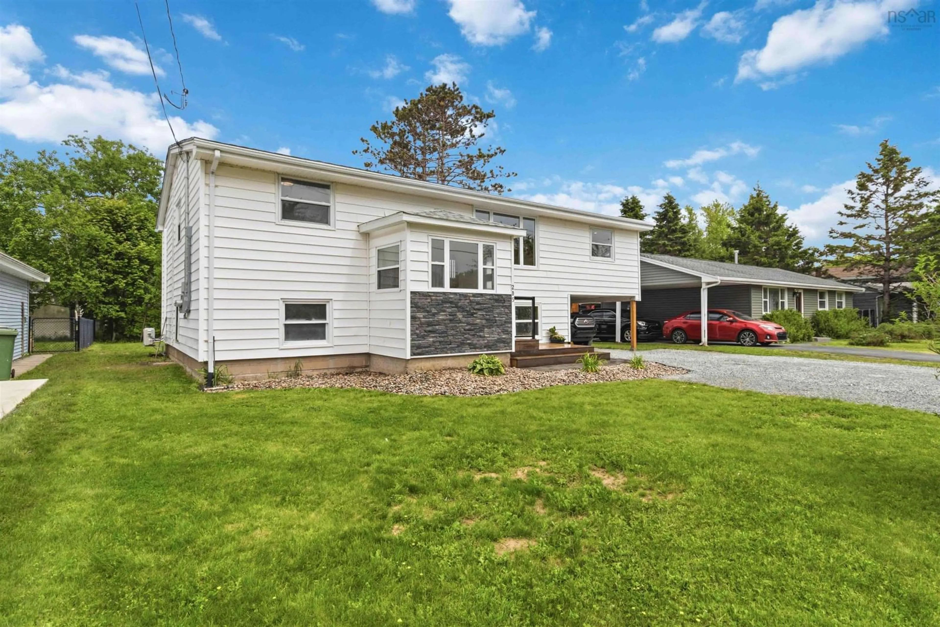 Home with vinyl exterior material, street for 205 Montague Rd, Lake Loon Nova Scotia B2W 3P6