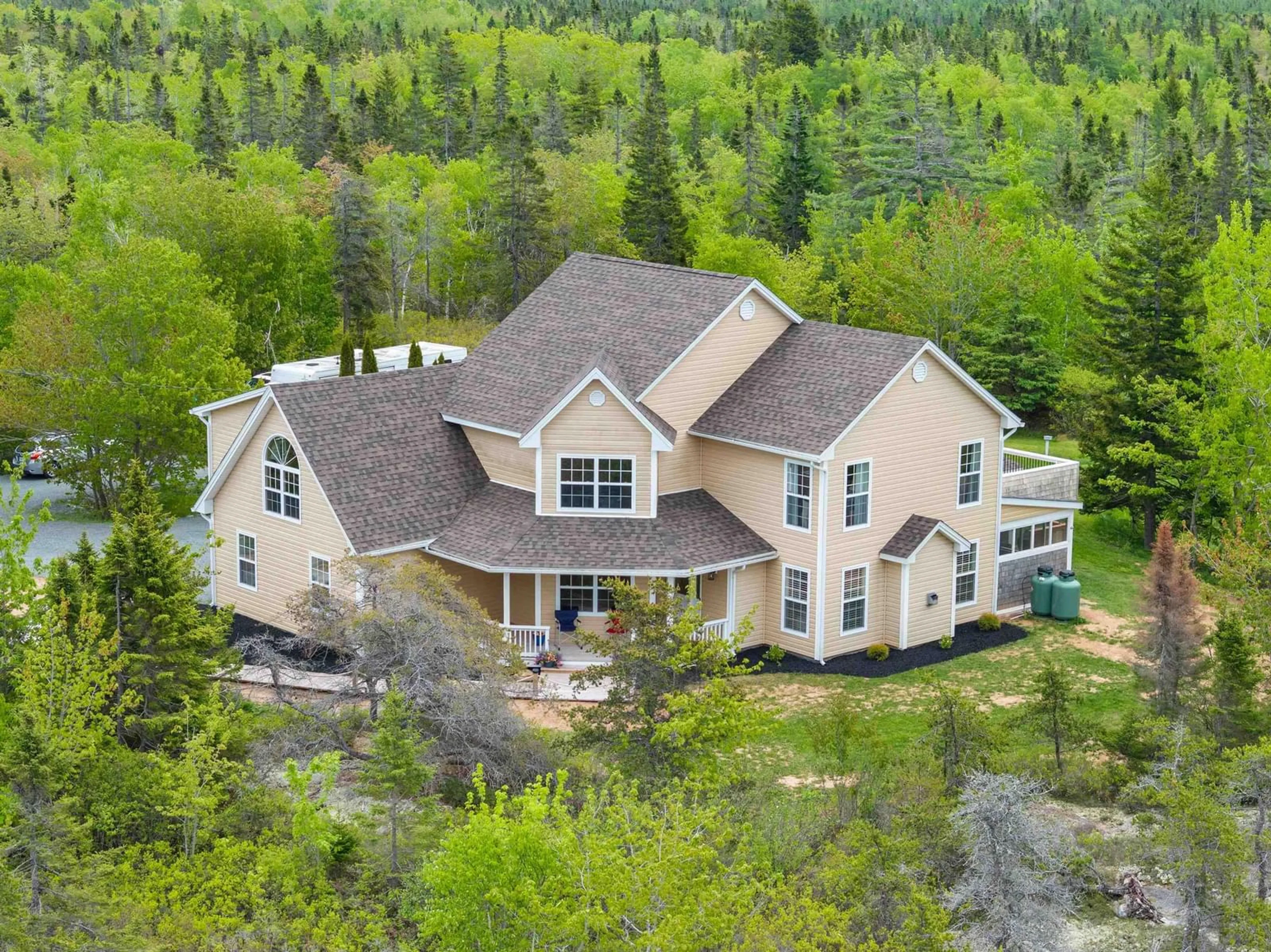 A pic from outside/outdoor area/front of a property/back of a property/a pic from drone, mountain view for 1021 Bissett Rd, Cow Bay Nova Scotia B3G 0A4