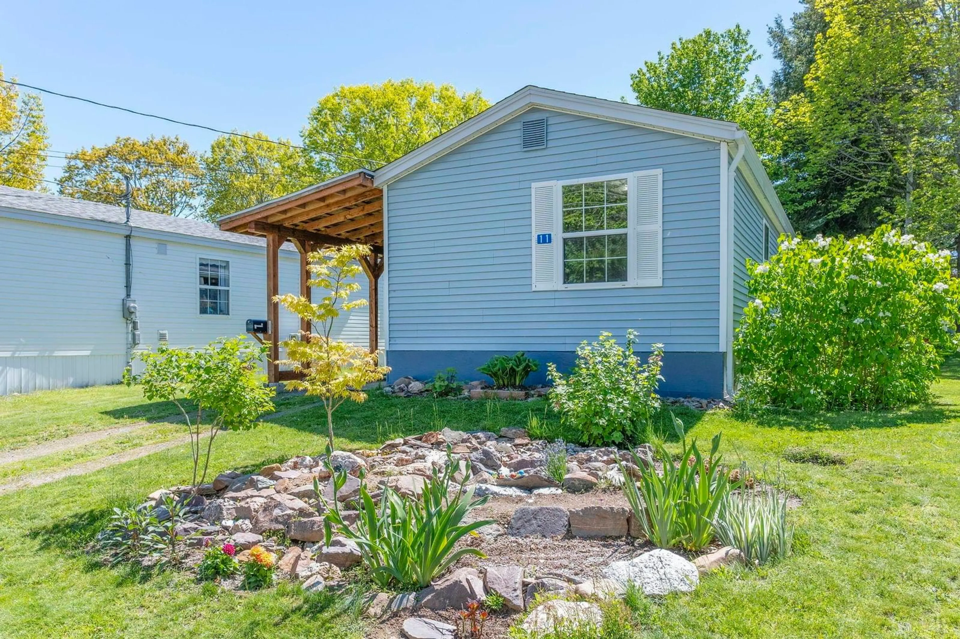 Home with vinyl exterior material, street for 11 Olympic Ave, New Minas Nova Scotia B4N 3T9