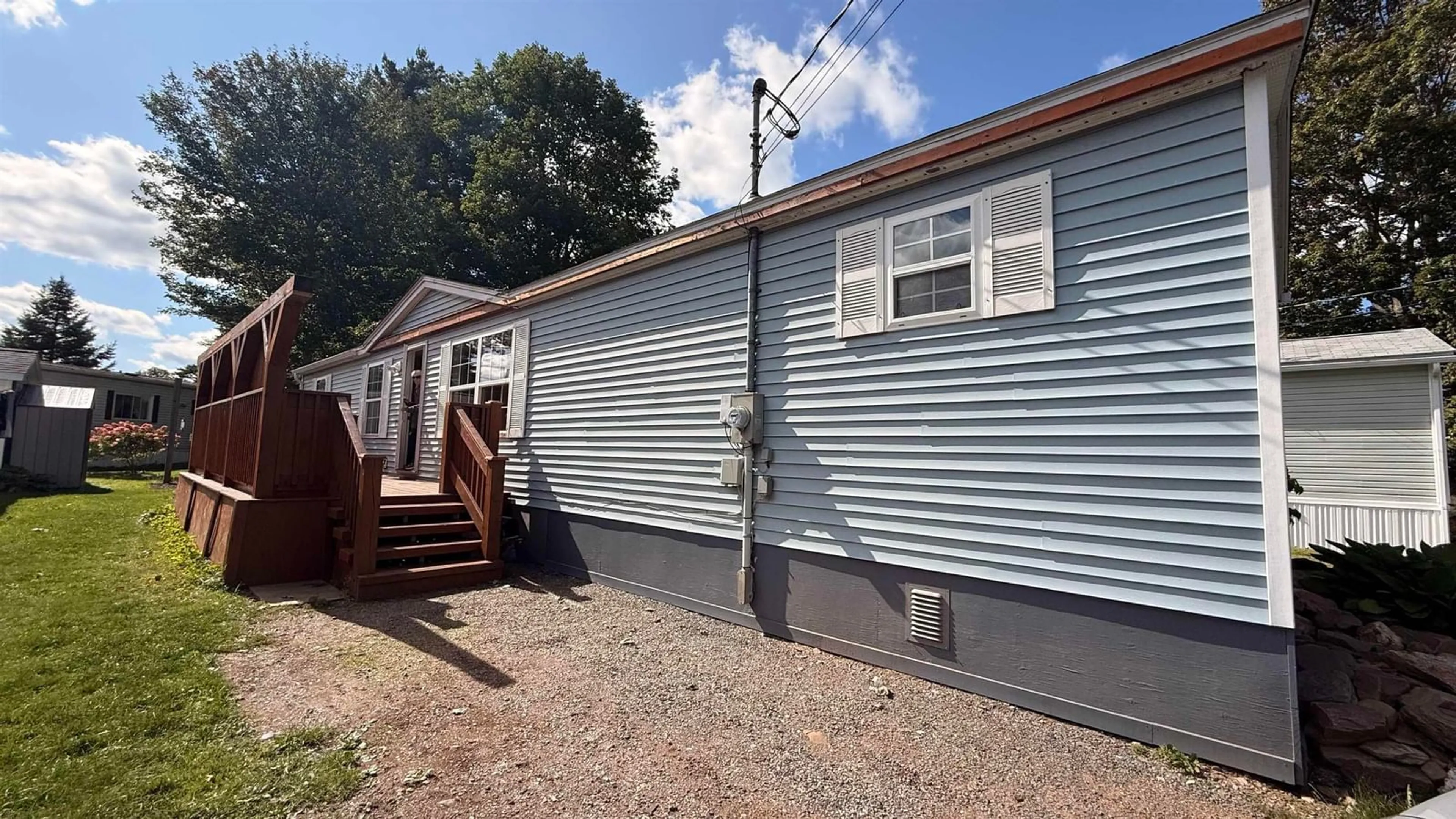 Home with vinyl exterior material, street for 11 Olympic Ave, New Minas Nova Scotia B4N 3T9