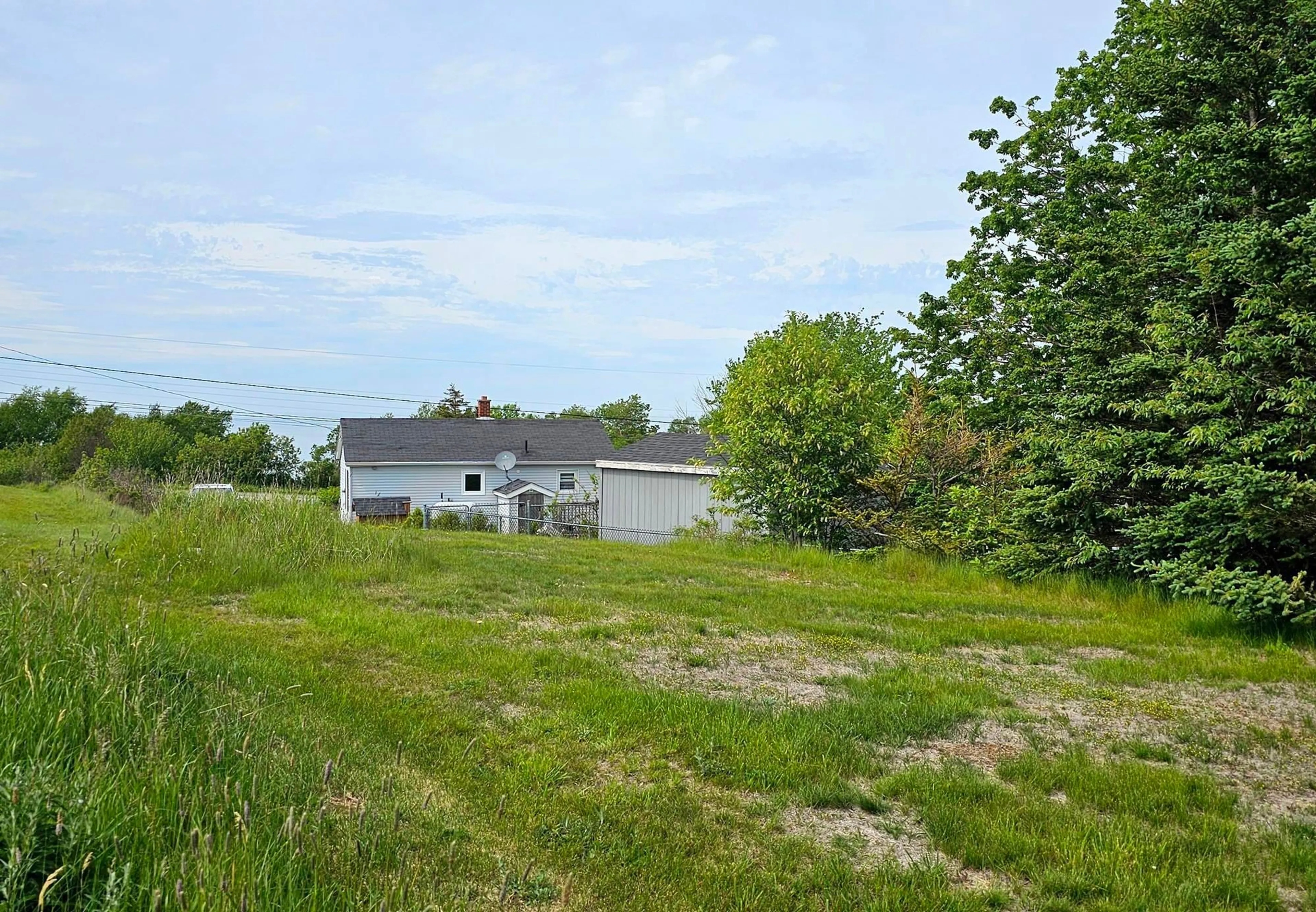 A pic from outside/outdoor area/front of a property/back of a property/a pic from drone, unknown for 5248 Shore Rd, Parkers Cove Nova Scotia B0S 1A0