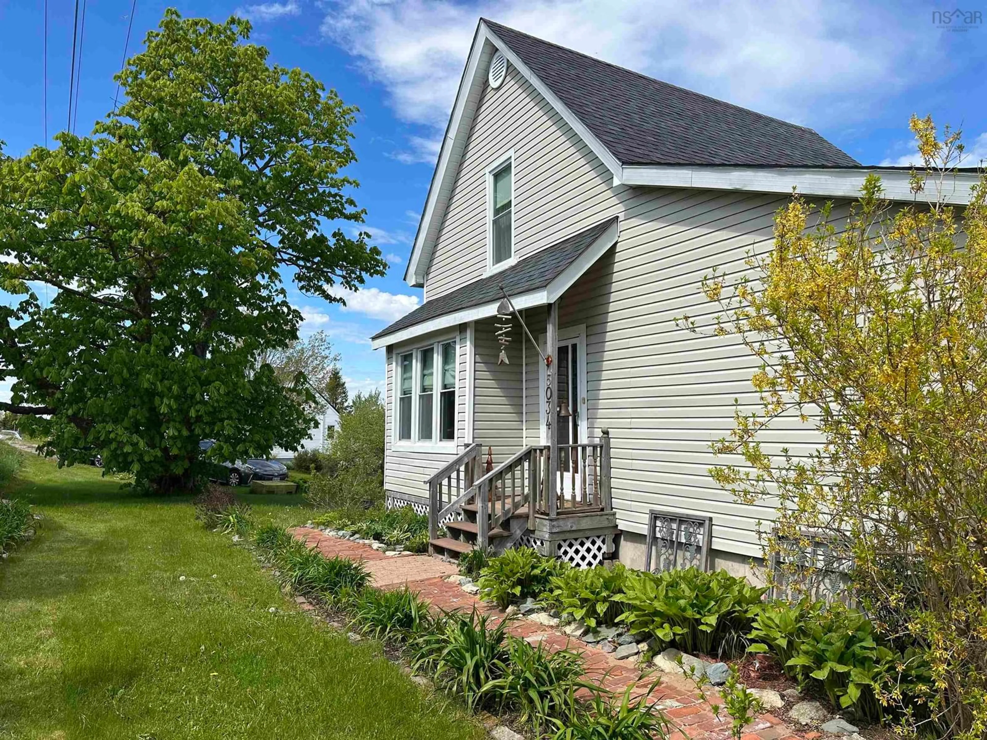 A pic from outside/outdoor area/front of a property/back of a property/a pic from drone, street for 5034 Highway 7, Liscomb Nova Scotia B0J 2A0