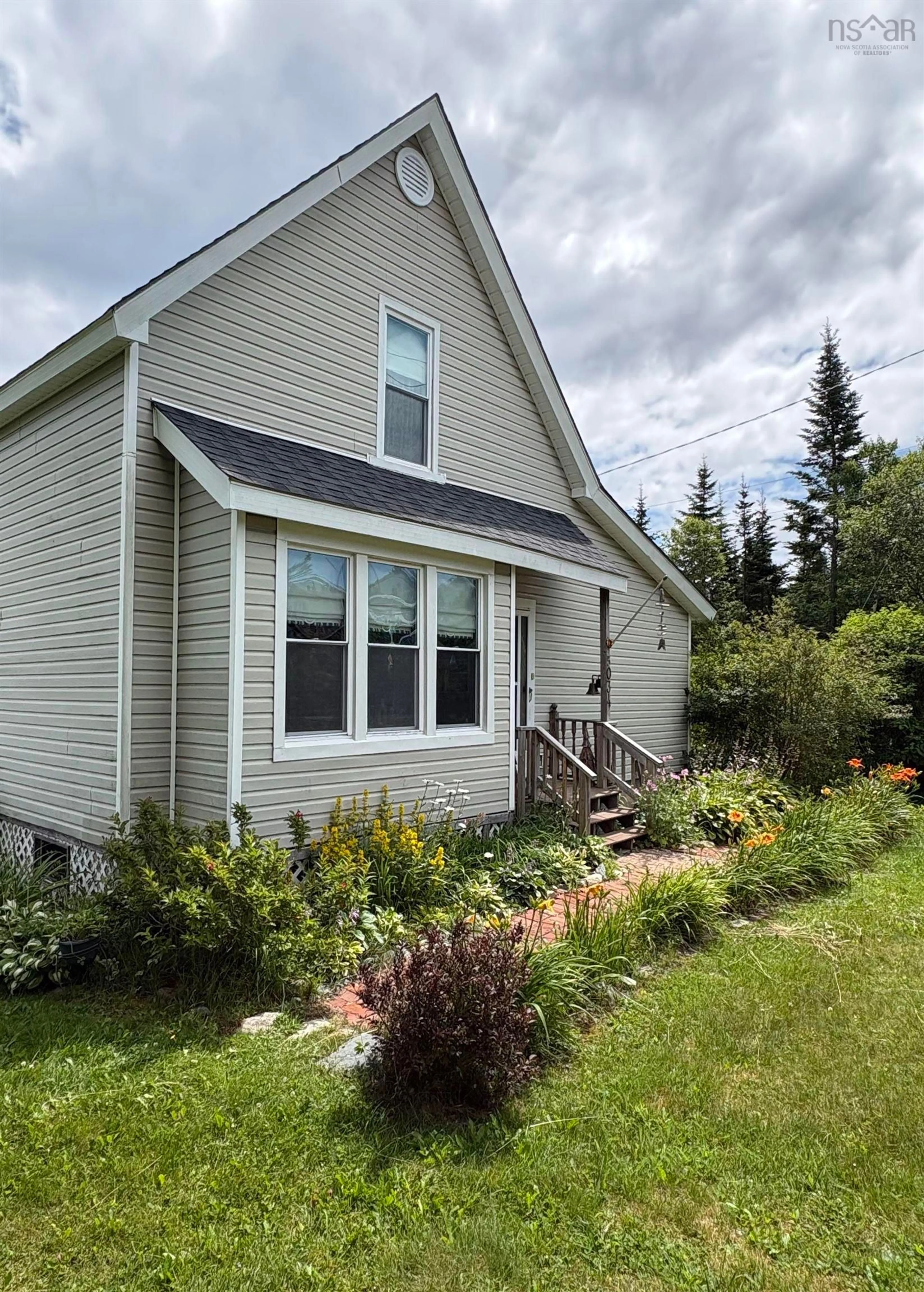 Home with vinyl exterior material, unknown for 5034 Highway 7, Liscomb Nova Scotia B0J 2A0