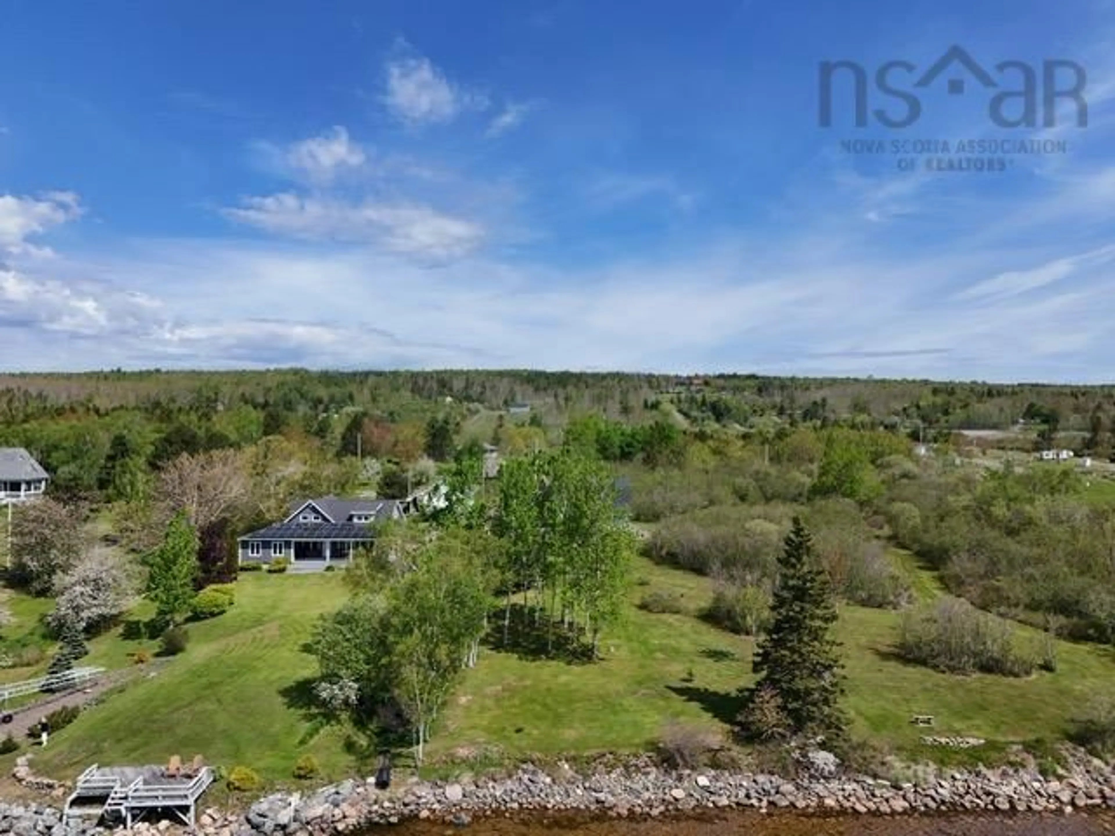 A pic from outside/outdoor area/front of a property/back of a property/a pic from drone, water/lake/river/ocean view for 68 D Hutchison Rd, Baddeck Inlet Nova Scotia B0E 1B0
