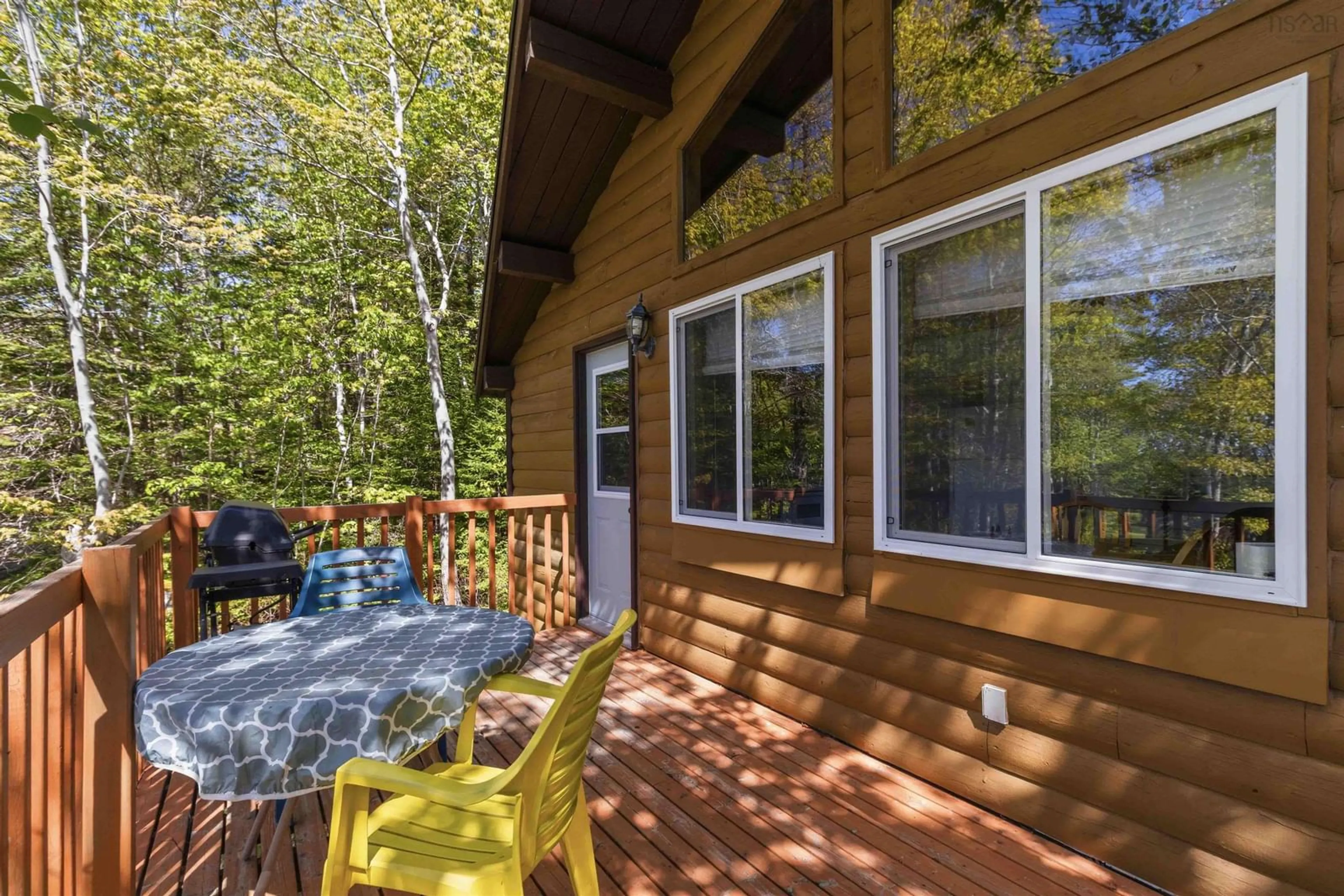 Patio, forest/trees view for 11 Beach View Lane #B4, Summerville Centre Nova Scotia B0T 1T0