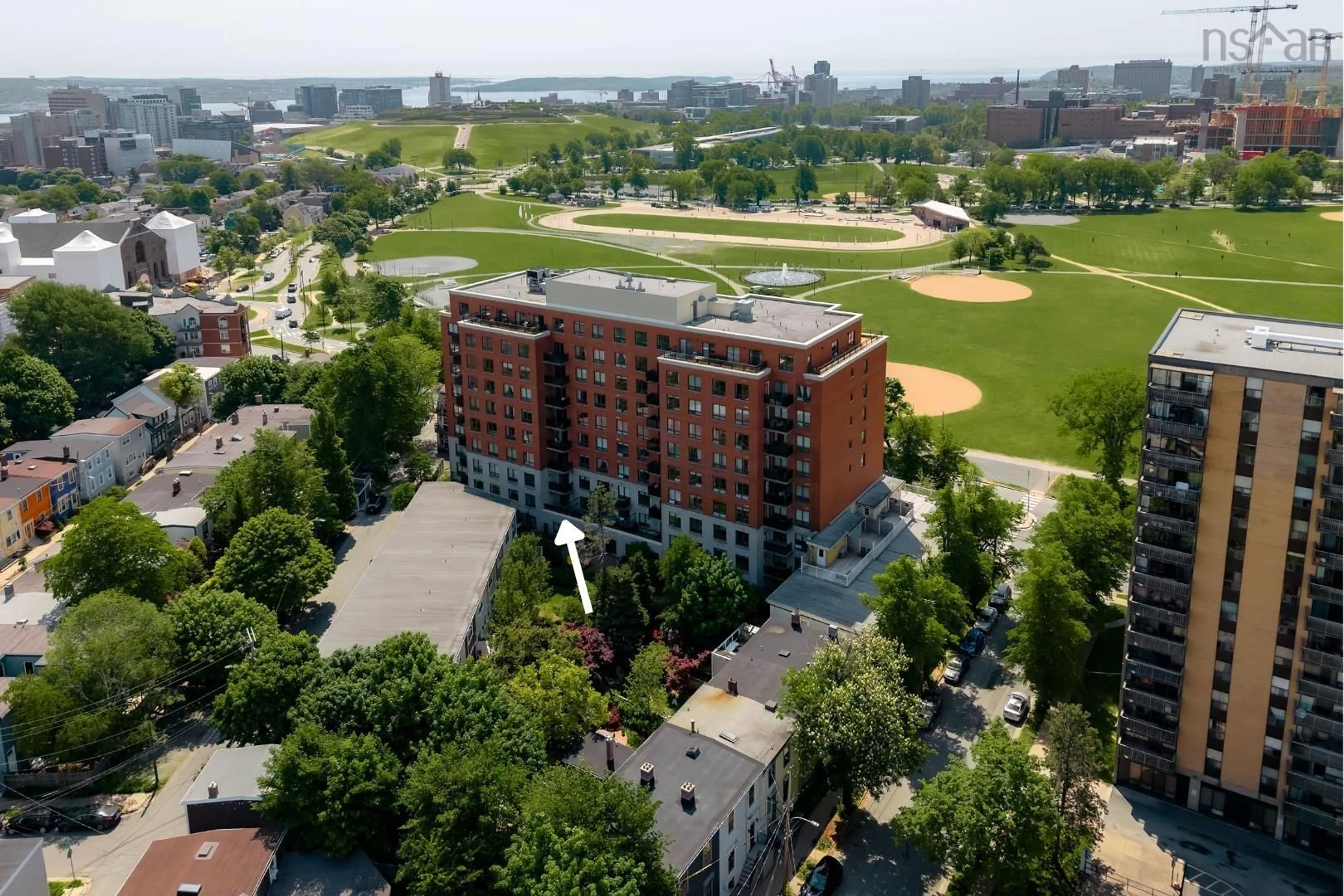 A pic from outside/outdoor area/front of a property/back of a property/a pic from drone, city buildings view from balcony for 5839 Cunard St #207, Halifax Nova Scotia B3K 0B9