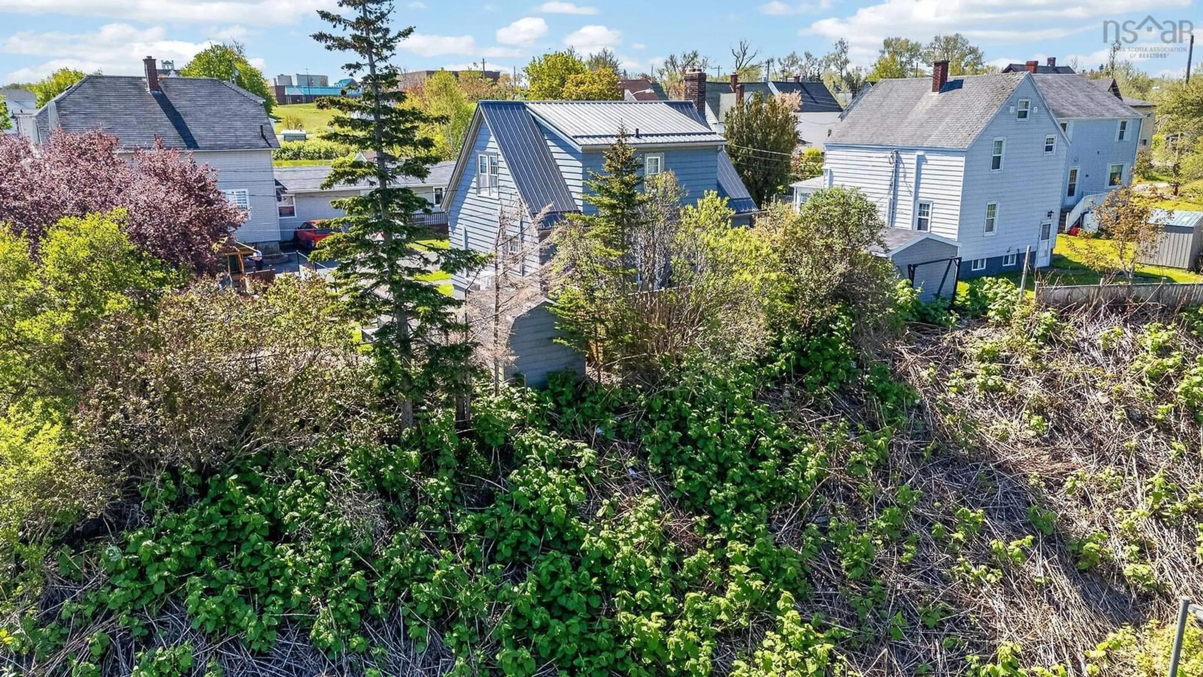 A pic from outside/outdoor area/front of a property/back of a property/a pic from drone, street for 36 Kent St, Glace Bay Nova Scotia B1A 1Z6