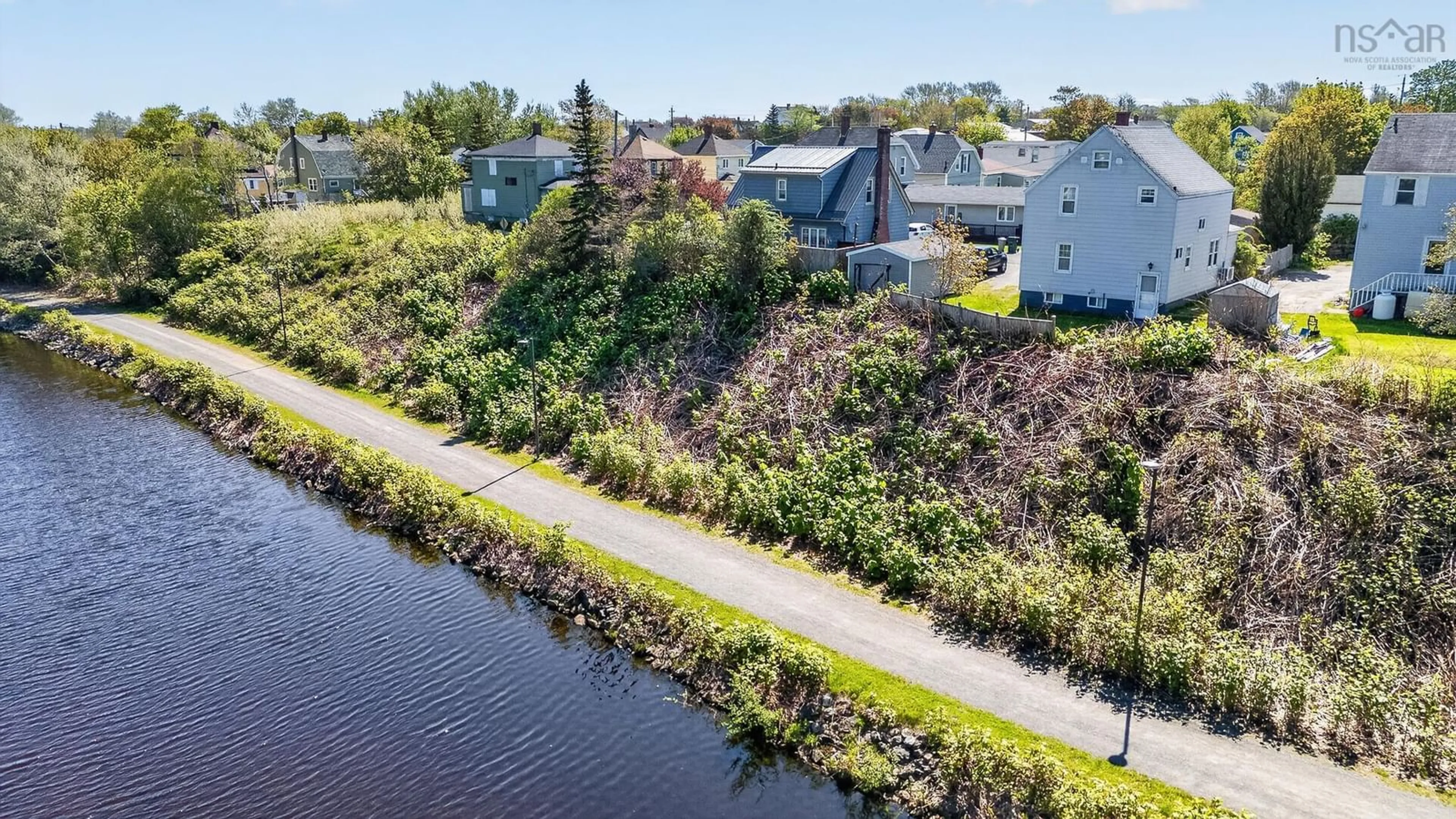 A pic from outside/outdoor area/front of a property/back of a property/a pic from drone, water/lake/river/ocean view for 36 Kent St, Glace Bay Nova Scotia B1A 1Z6