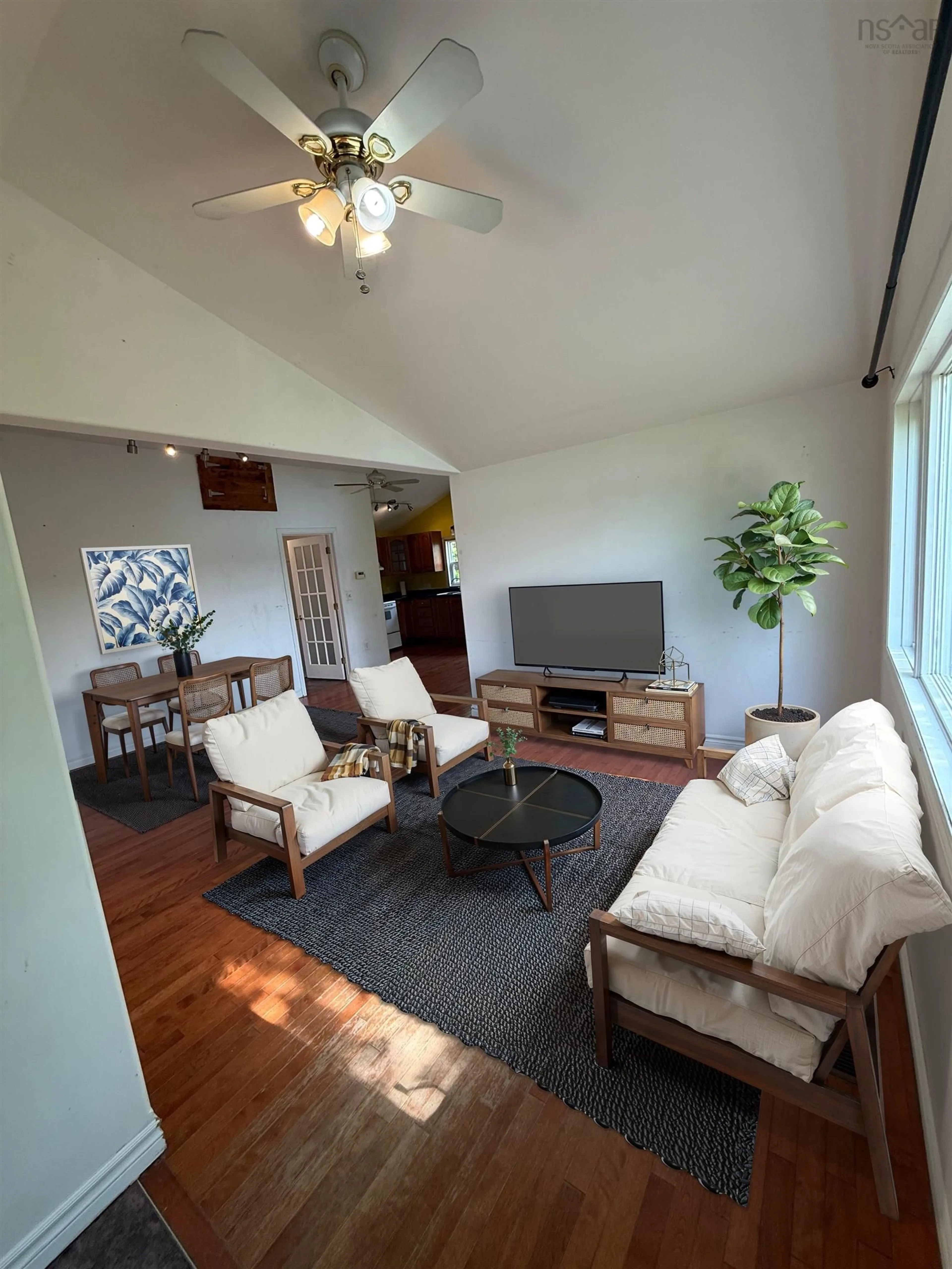 Living room with furniture, wood/laminate floor for 2618 2 Hwy, Waverley Nova Scotia B2R 1T1