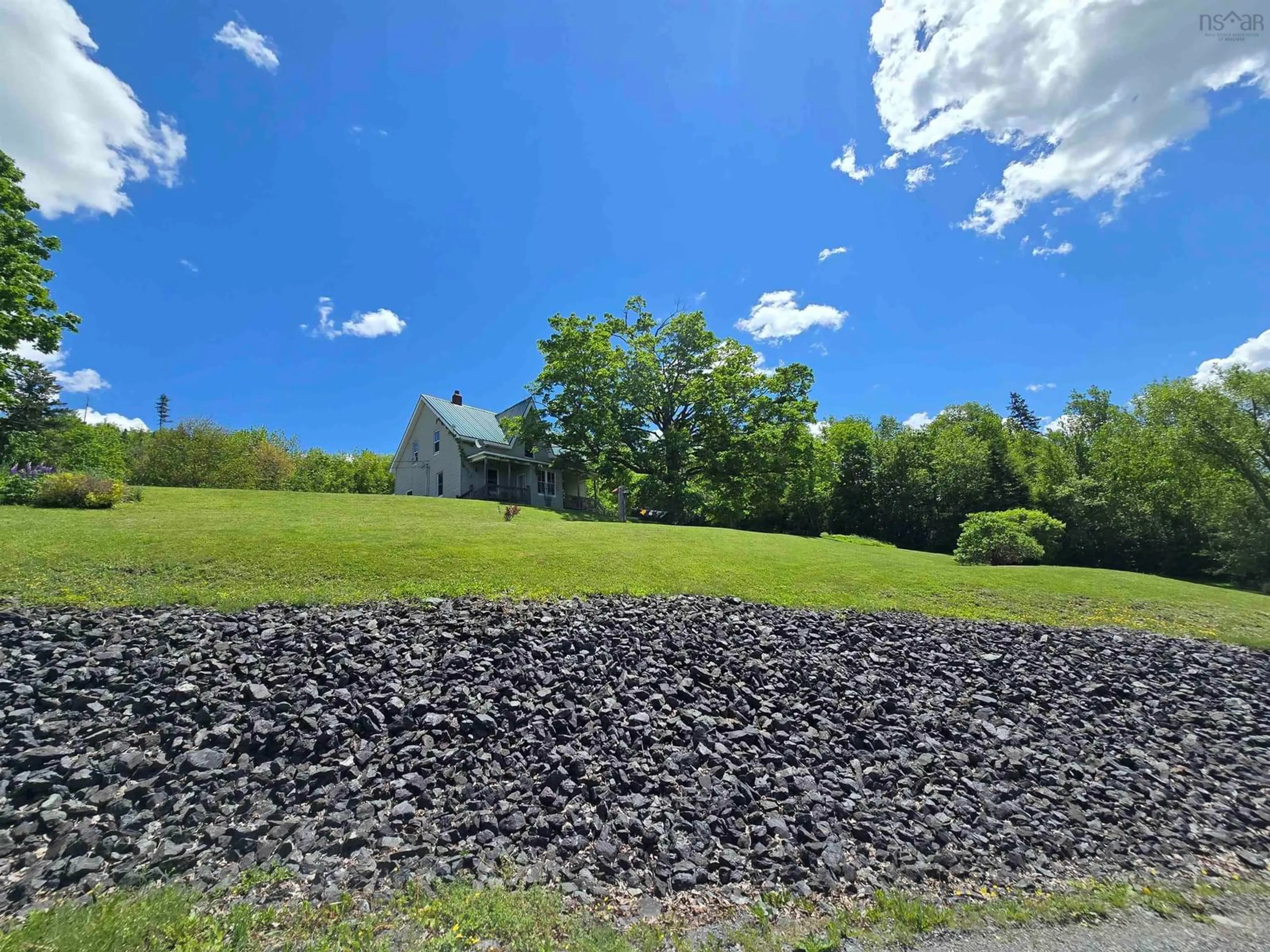 A pic from outside/outdoor area/front of a property/back of a property/a pic from drone, mountain view for 2058 East River East Side Rd, Bridgeville Nova Scotia B0K 1B0