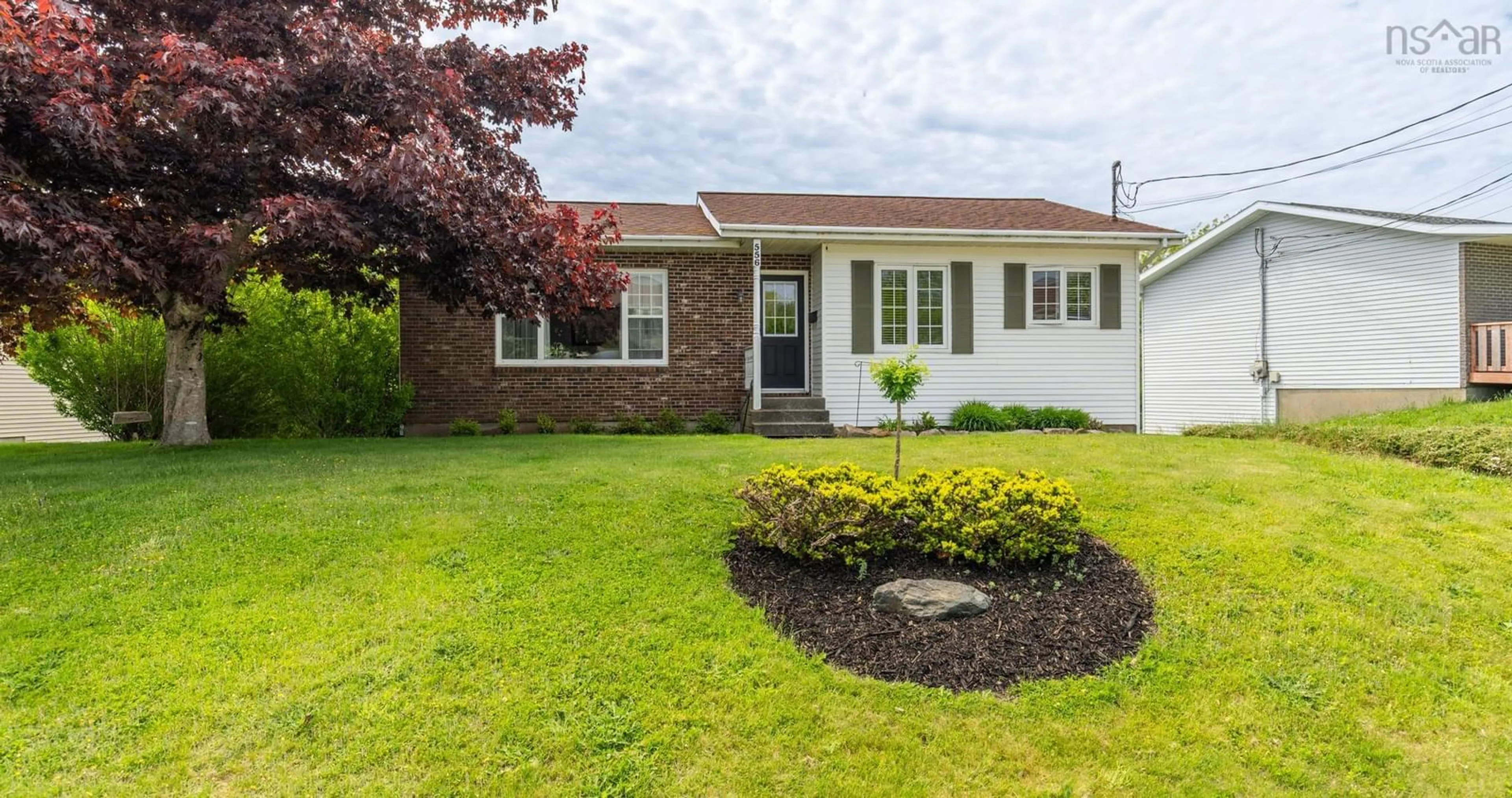 Home with vinyl exterior material, street for 556 Brunswick St, Yarmouth Nova Scotia B5A 4S8
