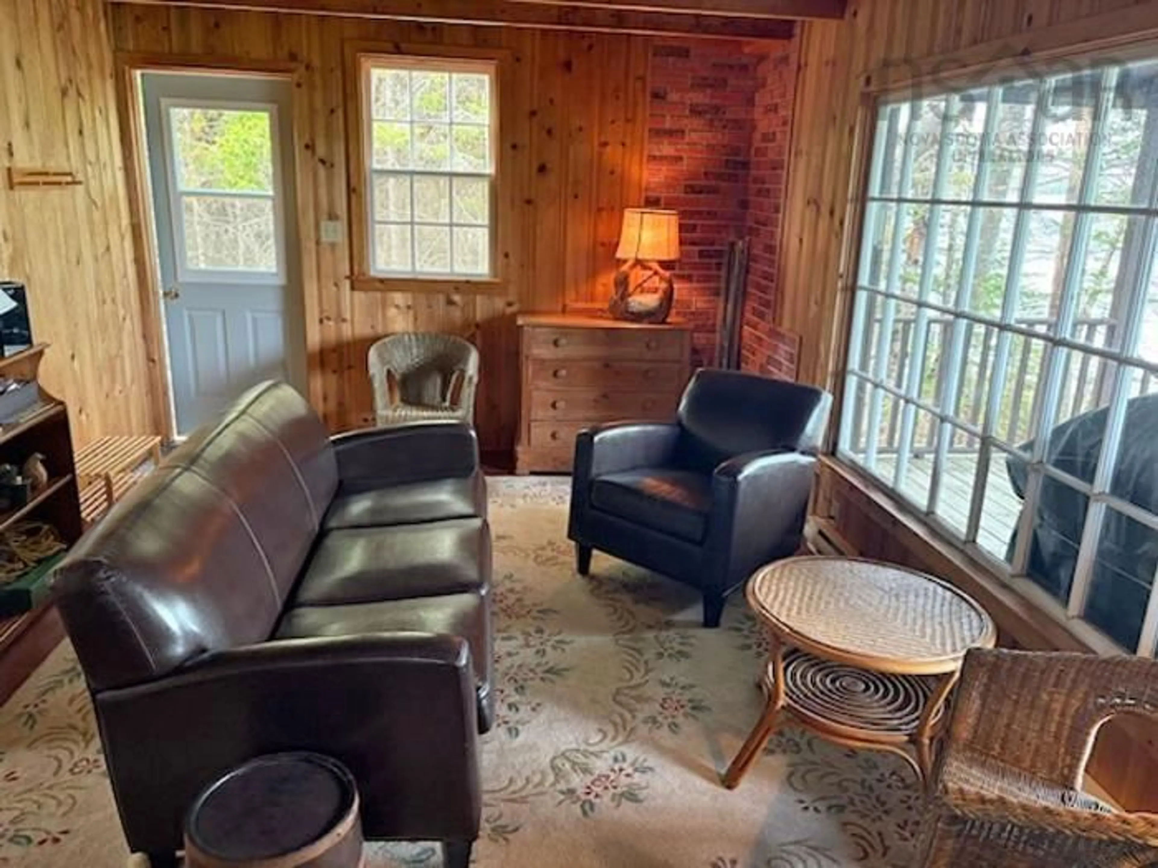 Living room with furniture, wood/laminate floor for 195 Beach Point Rd, Martins River Nova Scotia B0J 2E0