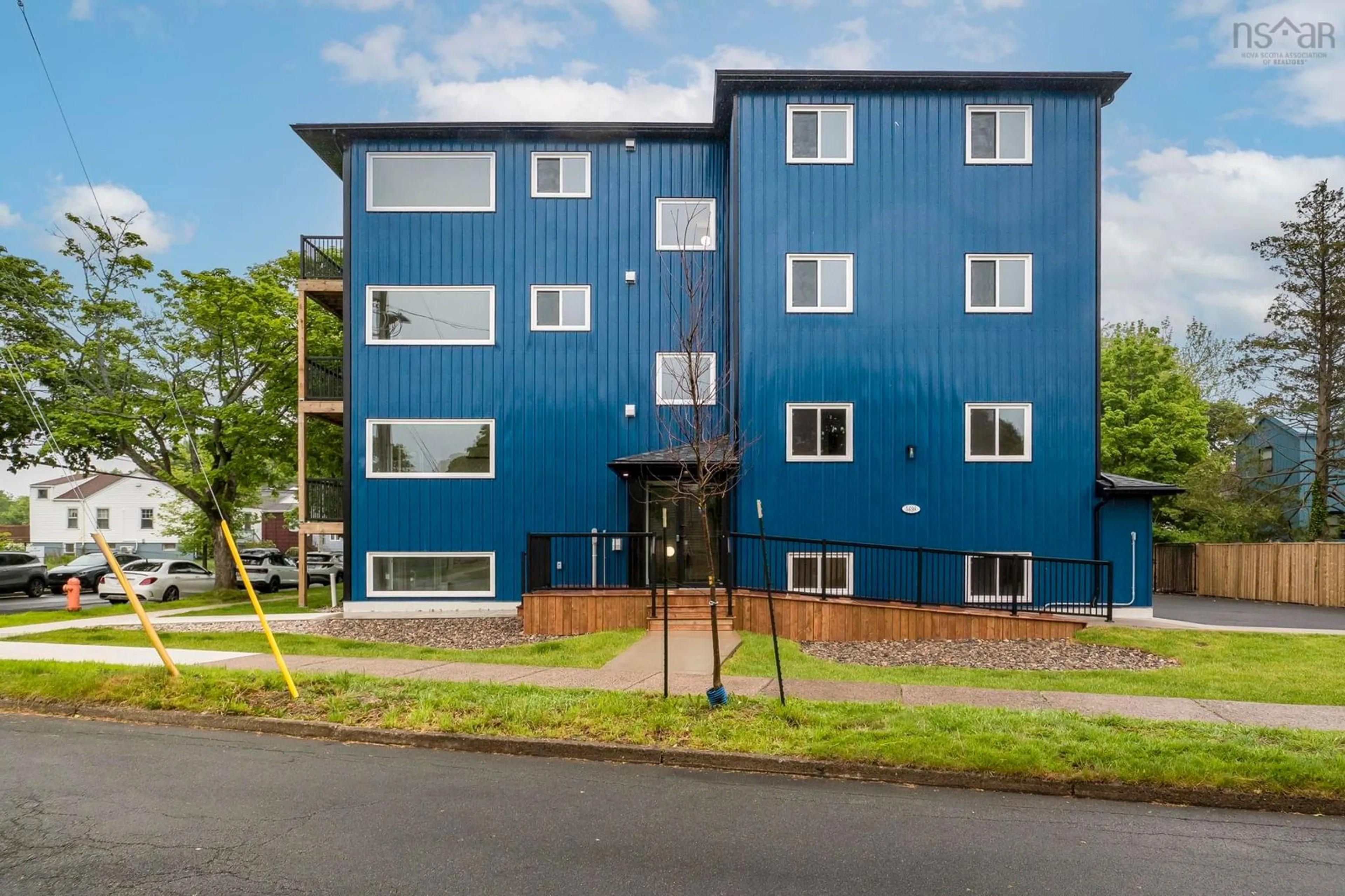 A pic from outside/outdoor area/front of a property/back of a property/a pic from drone, building for 5698 Normandy Dr #1, Halifax Nova Scotia B3K 4J7