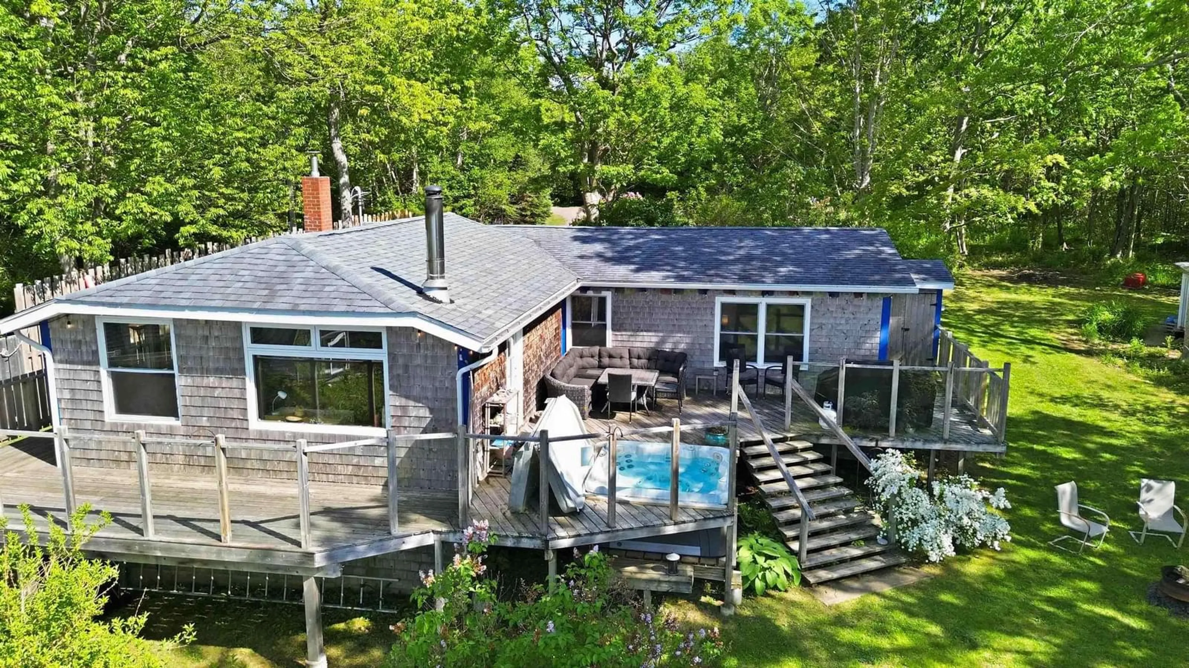 A pic from outside/outdoor area/front of a property/back of a property/a pic from drone, water/lake/river/ocean view for 68 Shore Dr, Deep Brook Nova Scotia B0S 1J0