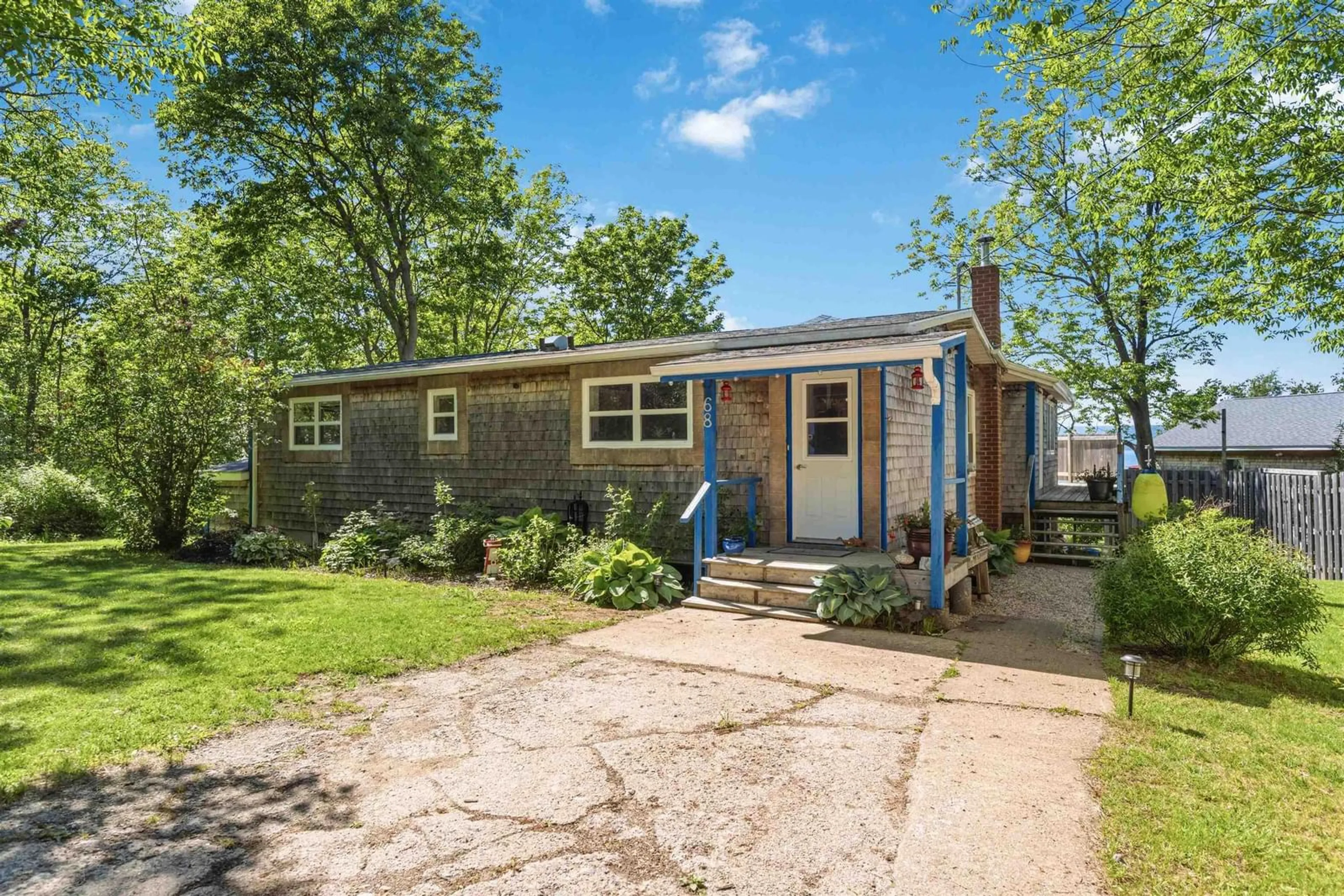 Home with vinyl exterior material, street for 68 Shore Dr, Deep Brook Nova Scotia B0S 1J0