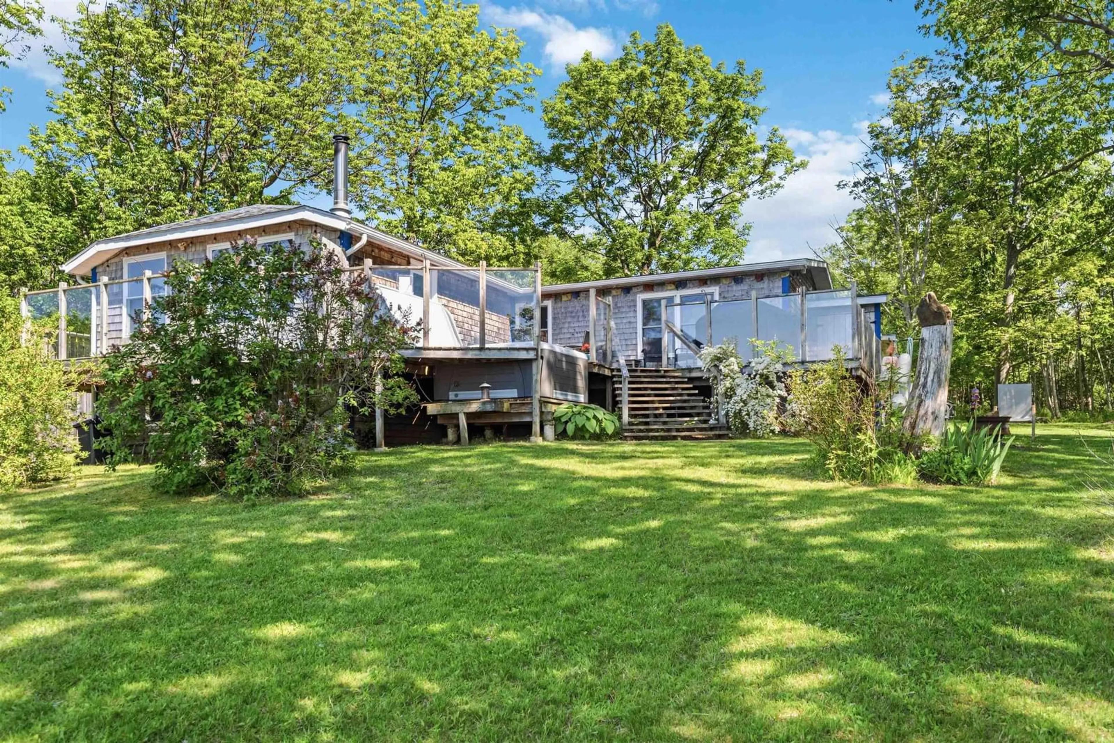 A pic from outside/outdoor area/front of a property/back of a property/a pic from drone, water/lake/river/ocean view for 68 Shore Dr, Deep Brook Nova Scotia B0S 1J0