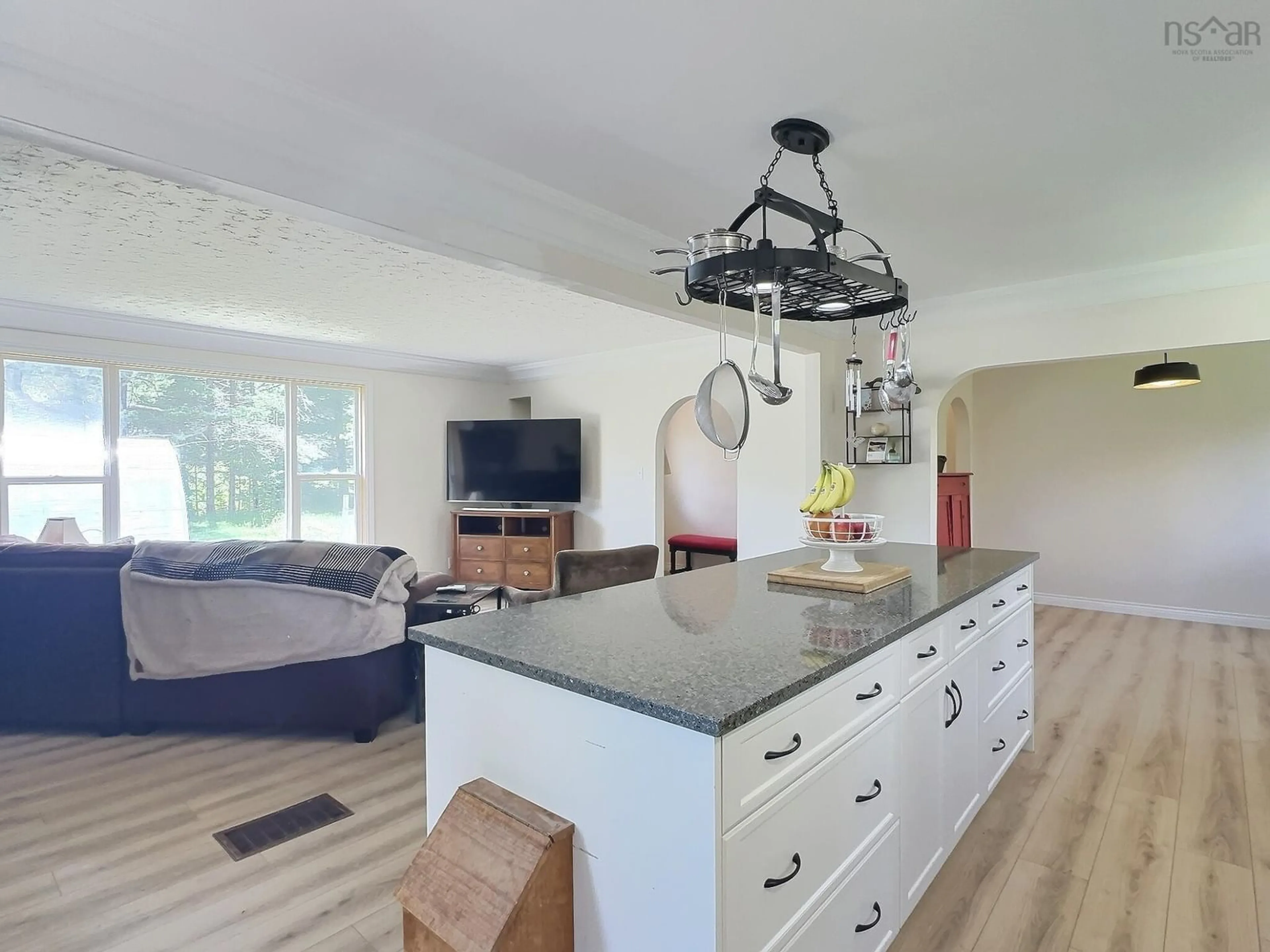 Open concept kitchen, wood/laminate floor for 37 Johnson Rd, Harmony Nova Scotia B6L 3S5